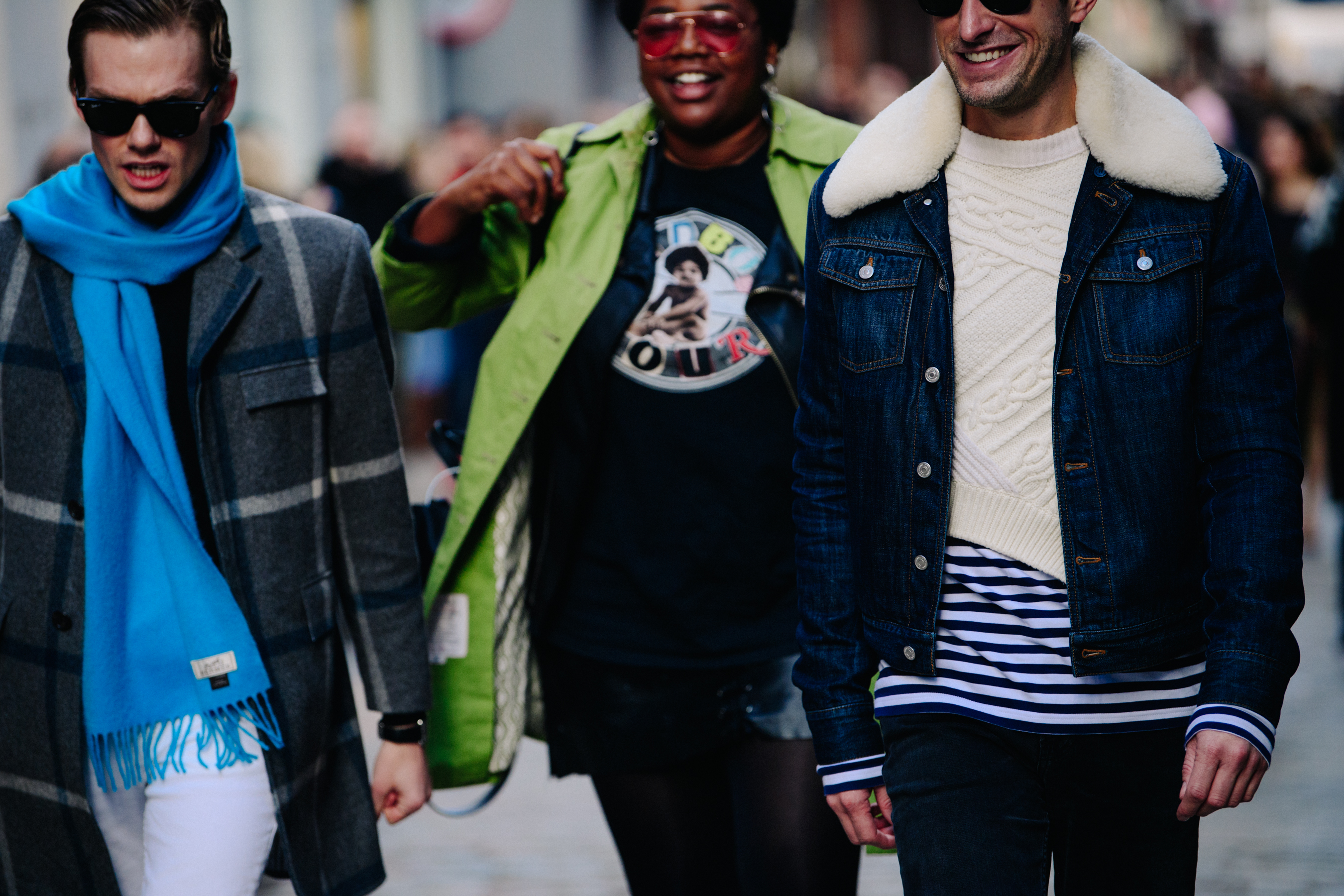 Three well dressed people