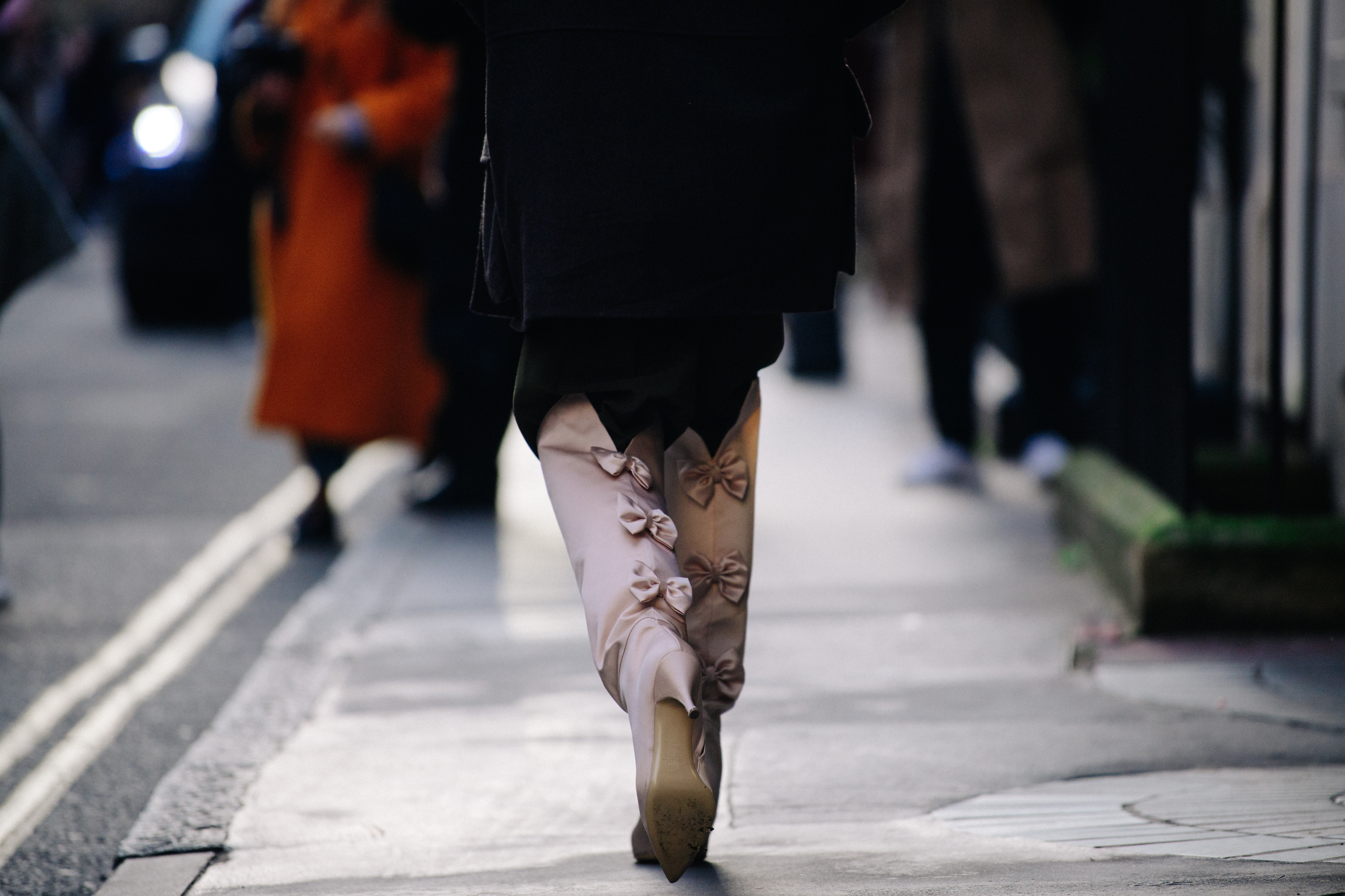 Woman wearing bow detail boots