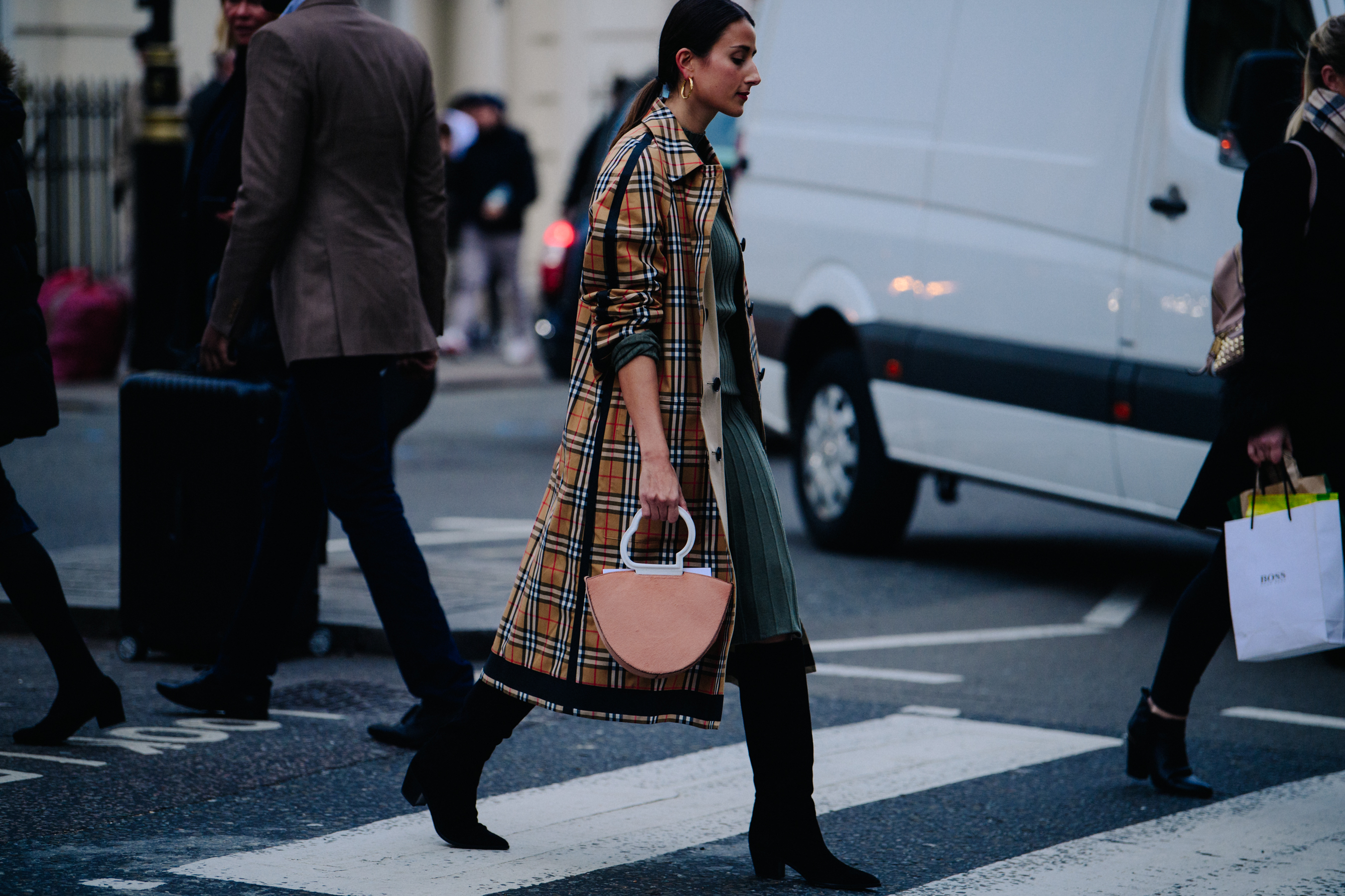Woman wearing Burberry coat