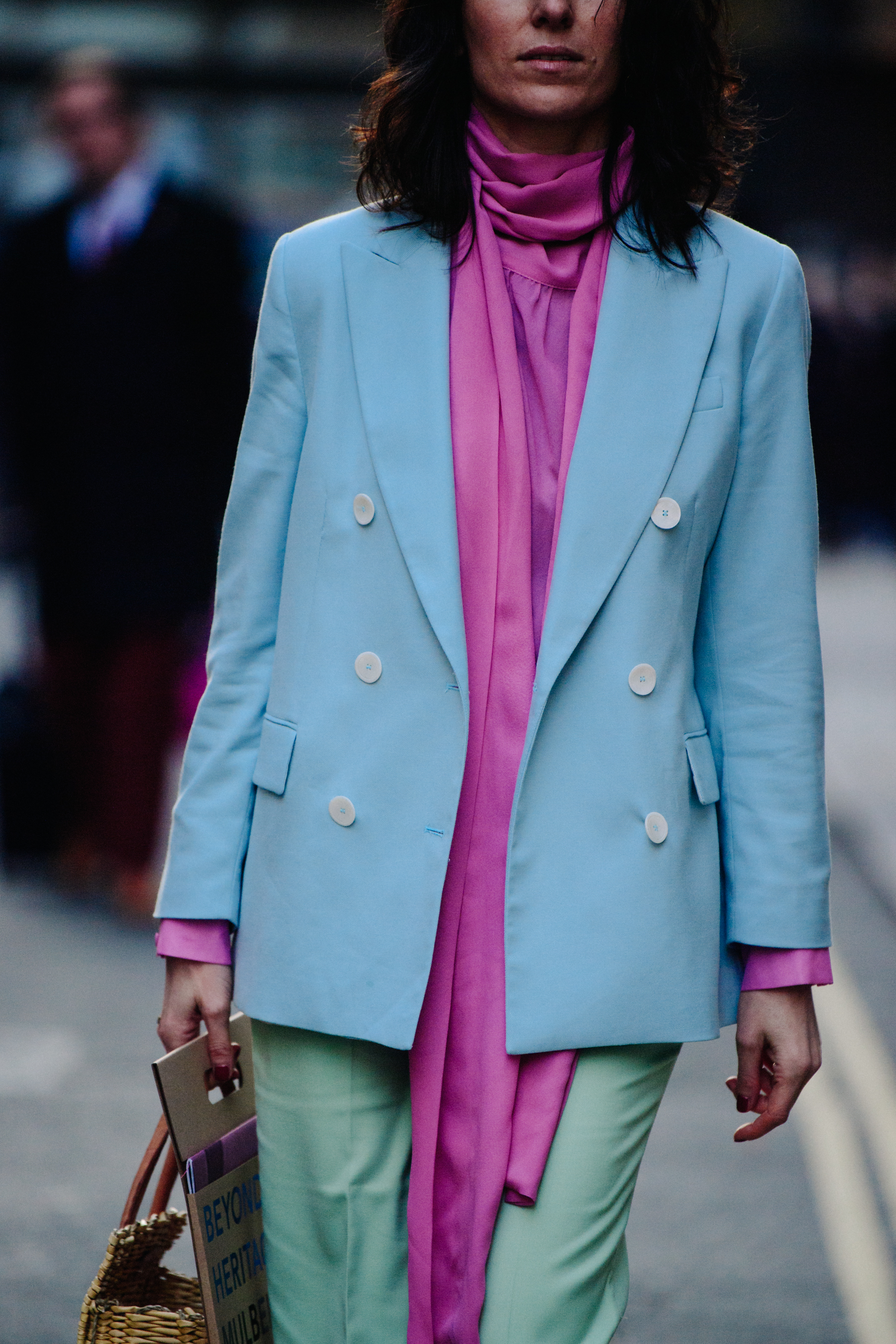 Woman wearing blue and green outfit