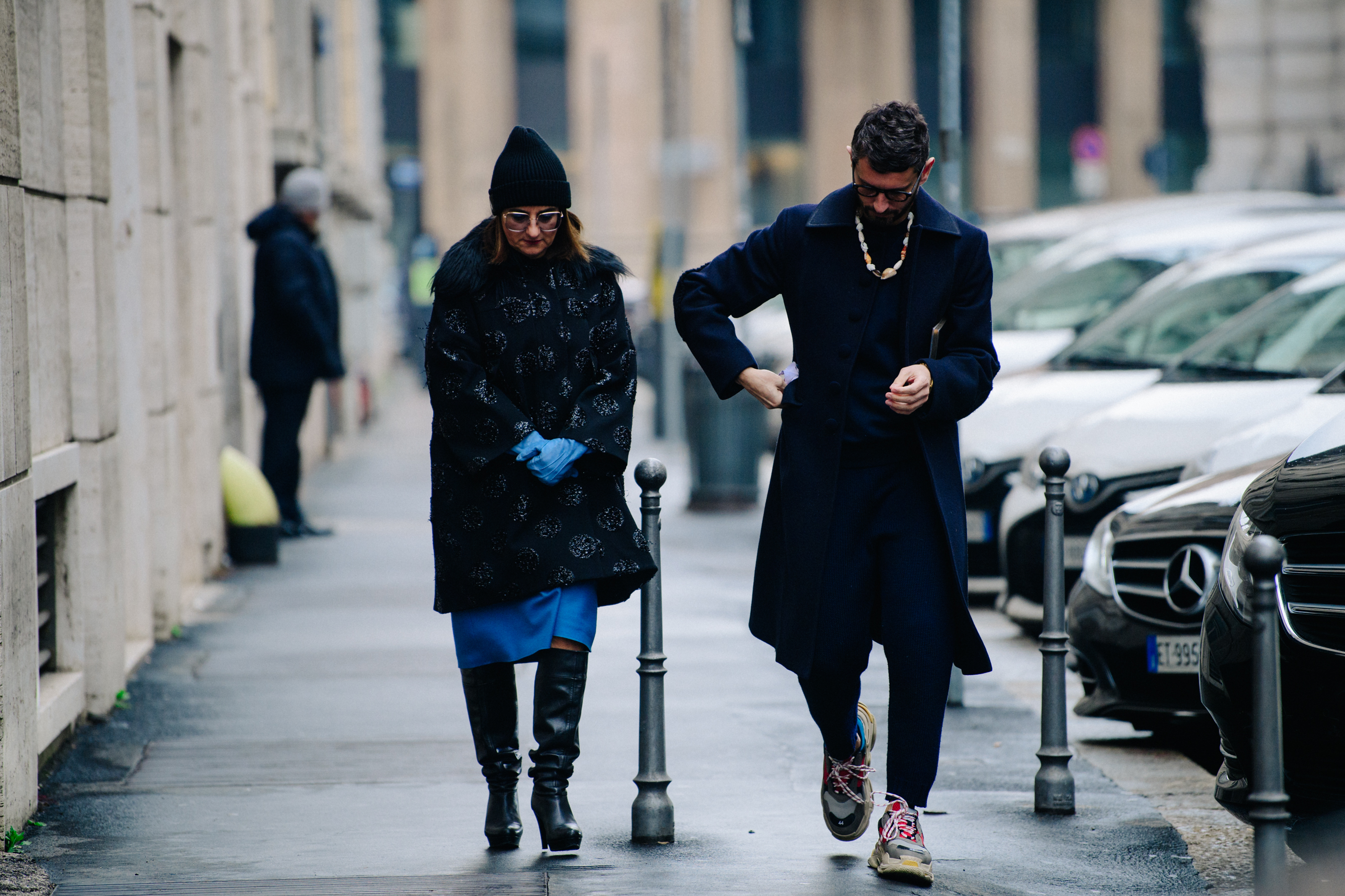 Couple wearing navy blue outfits