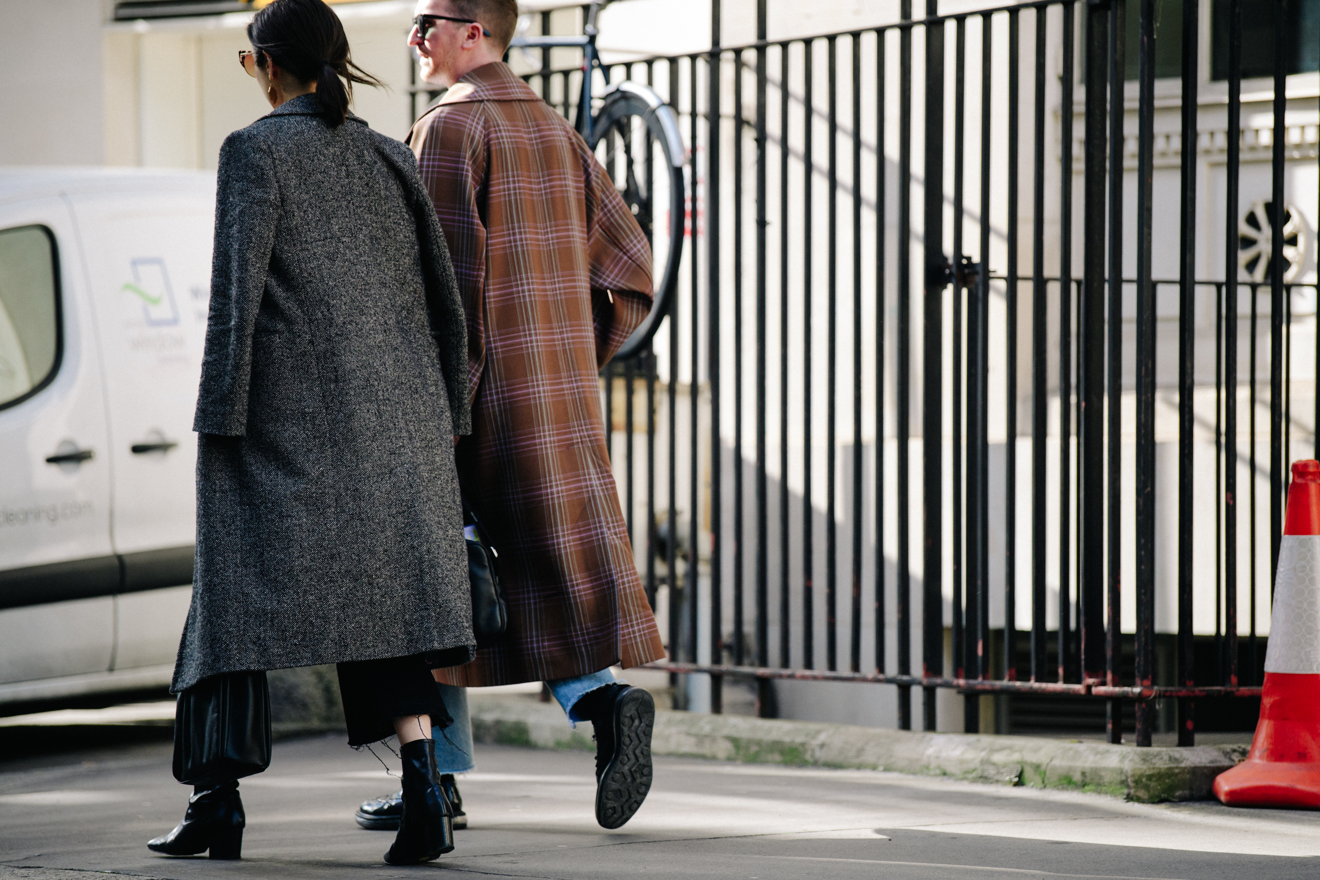 Couple wearing long wool coats