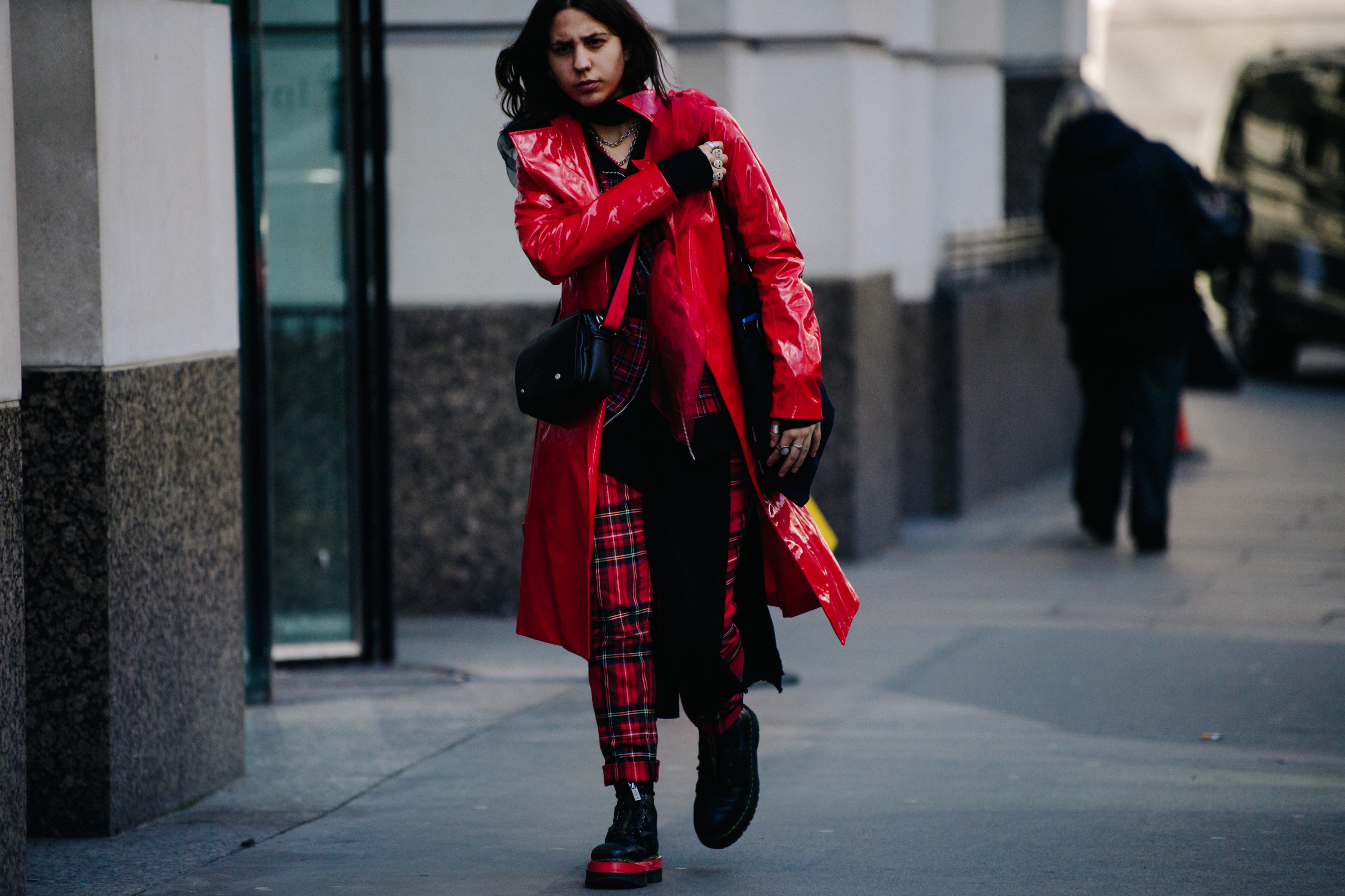 Woman wearing red and tartan outfit