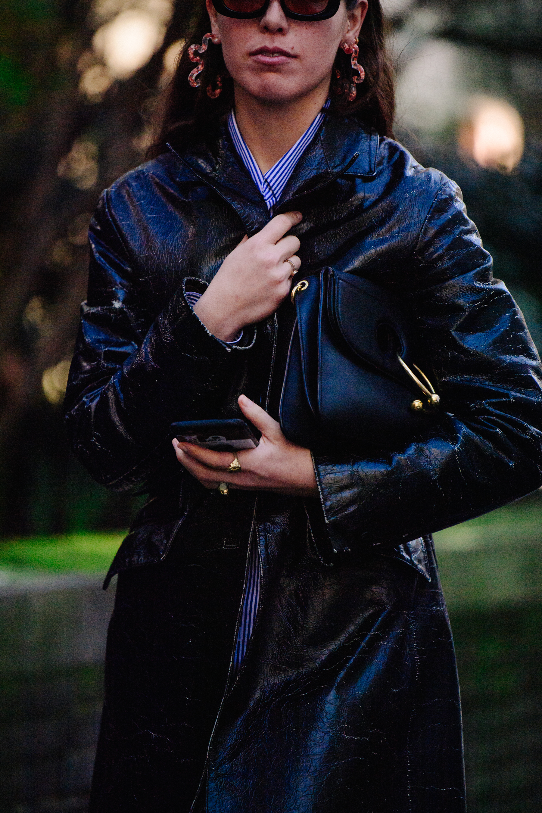 Woman wearing long black coat