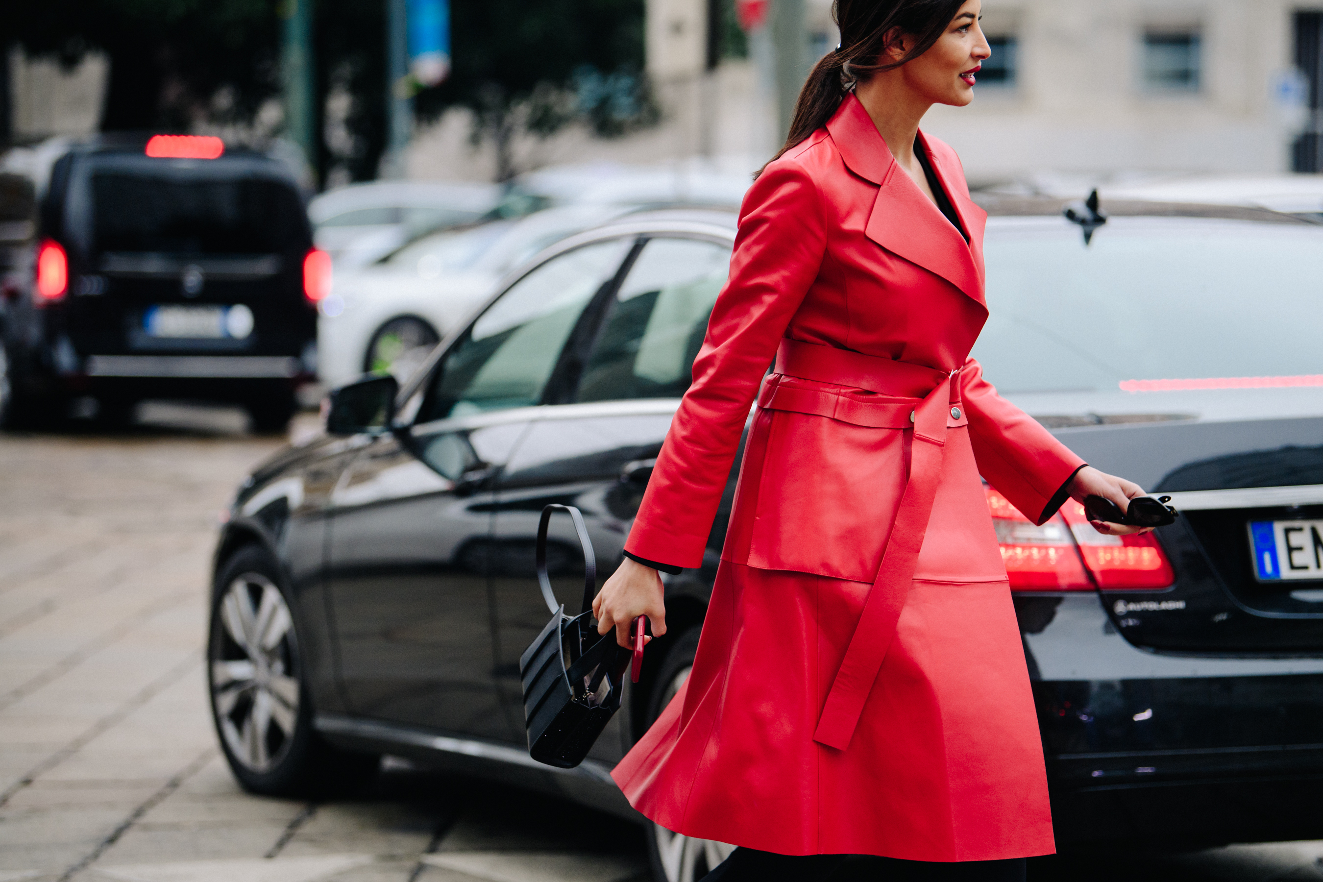 Woman wearing long red coat