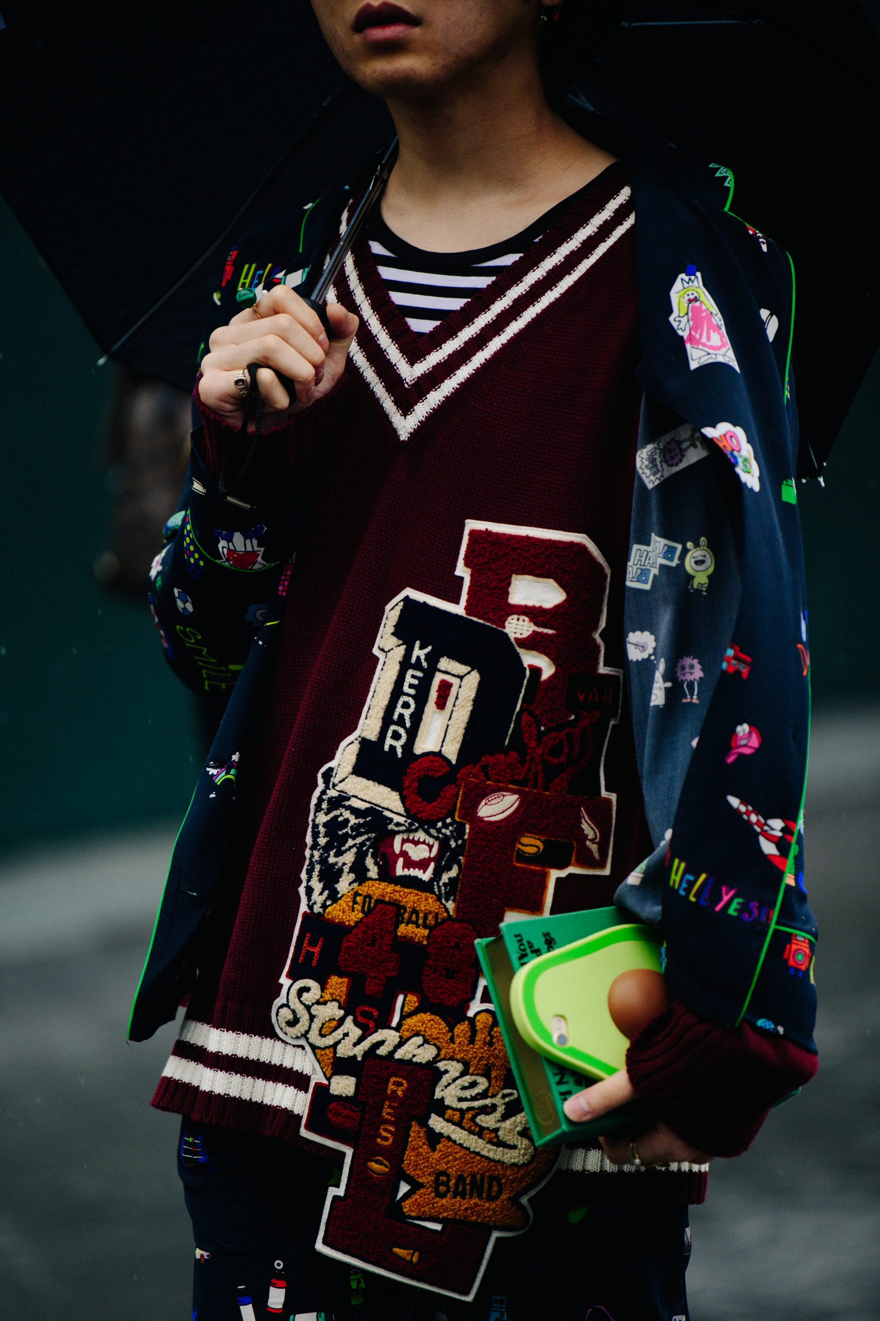 Man wearing knit sports jumper