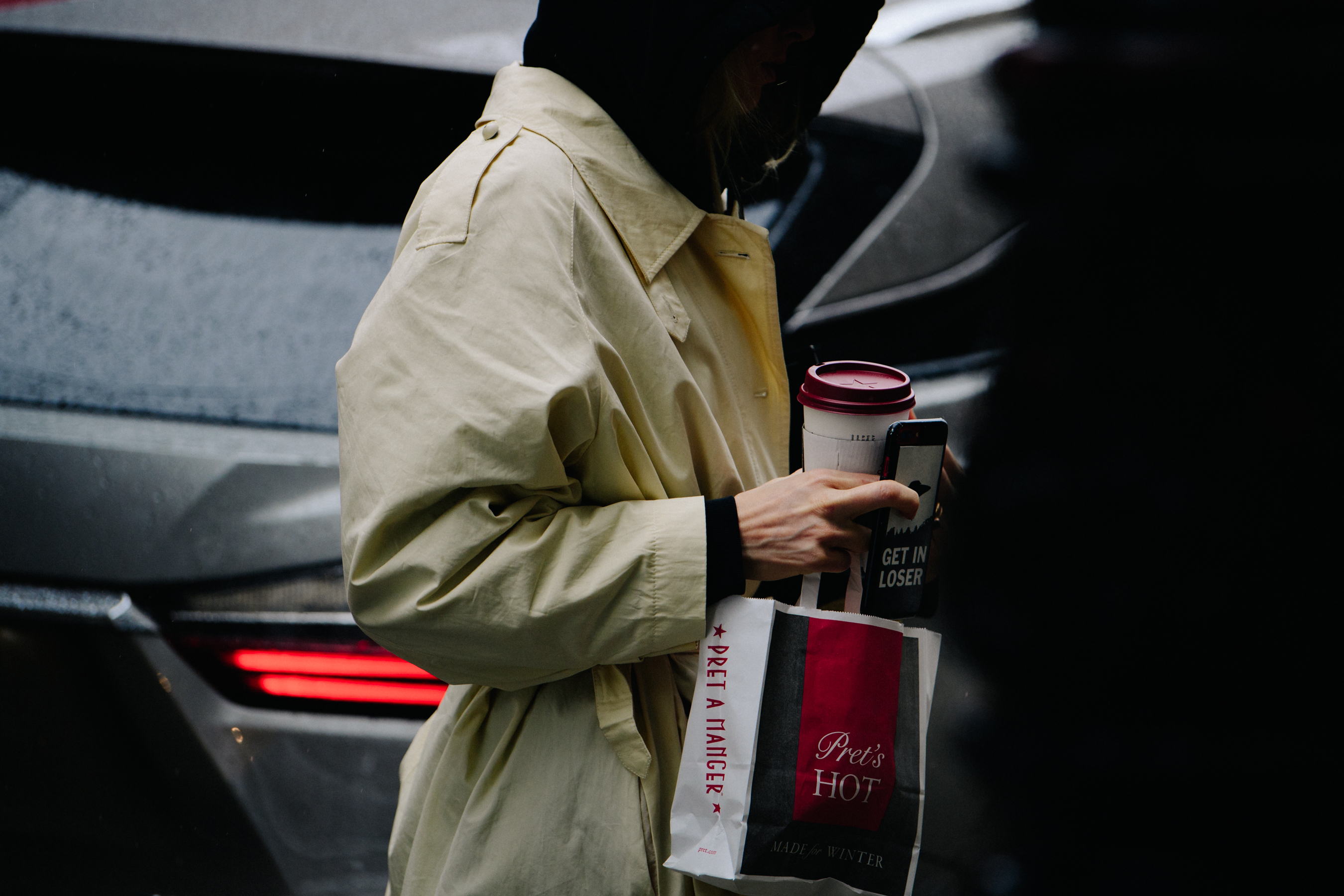 Woman wearing light trench coat