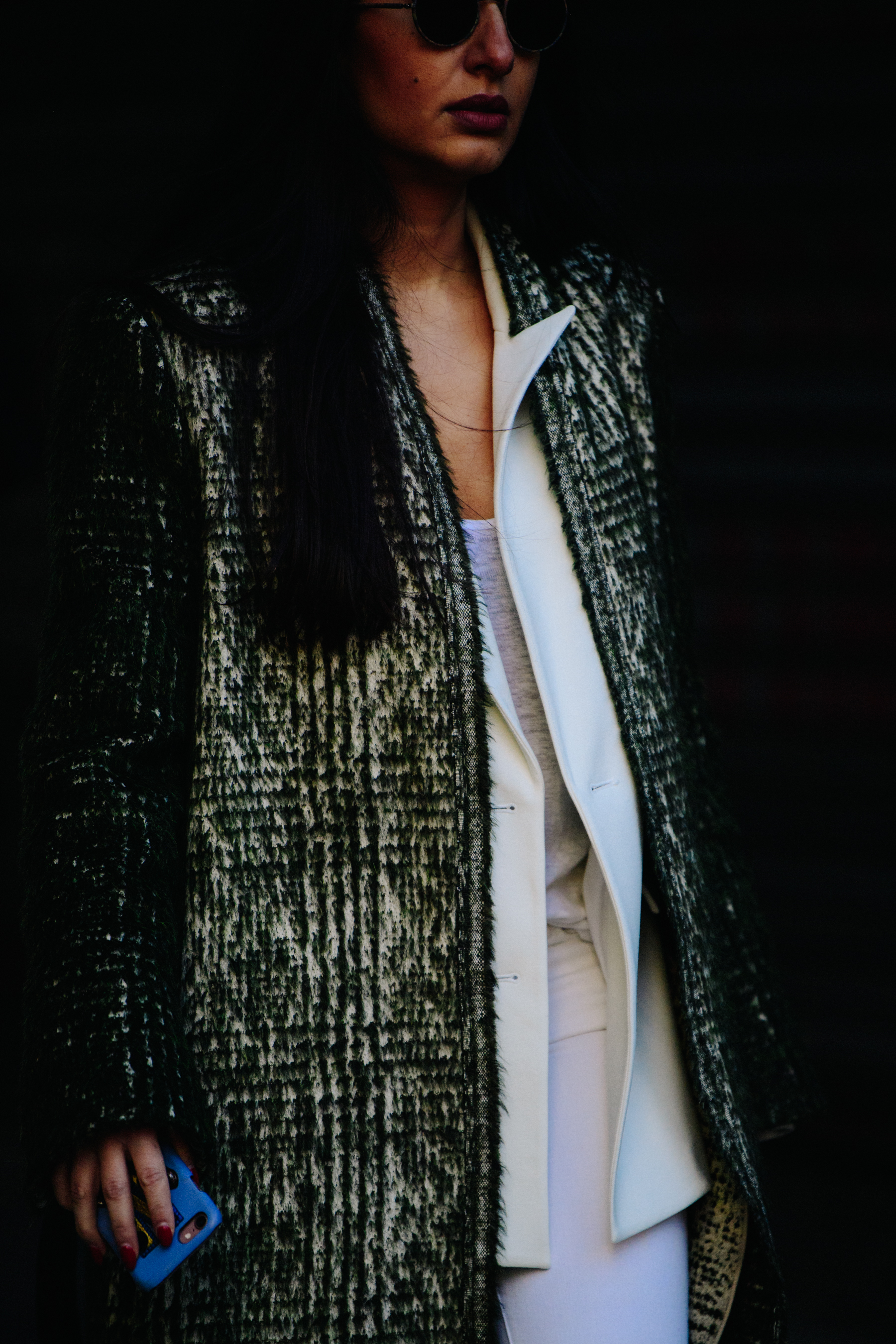 Woman wearing green wool coat