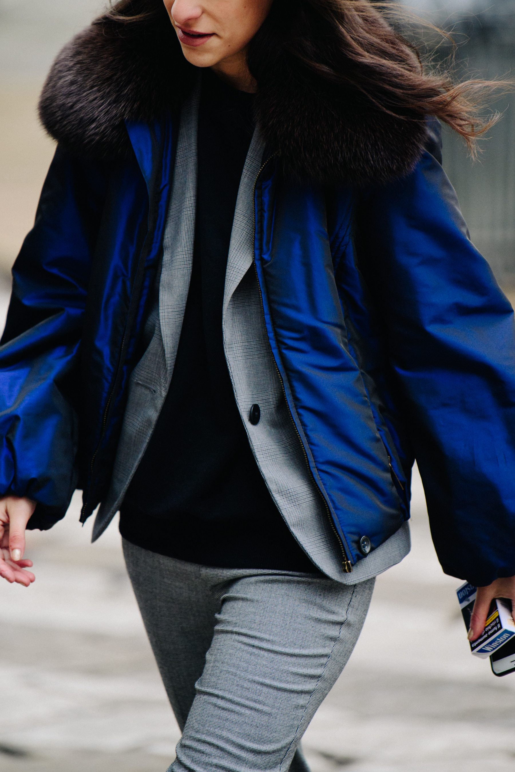 Woman wearing blue coat