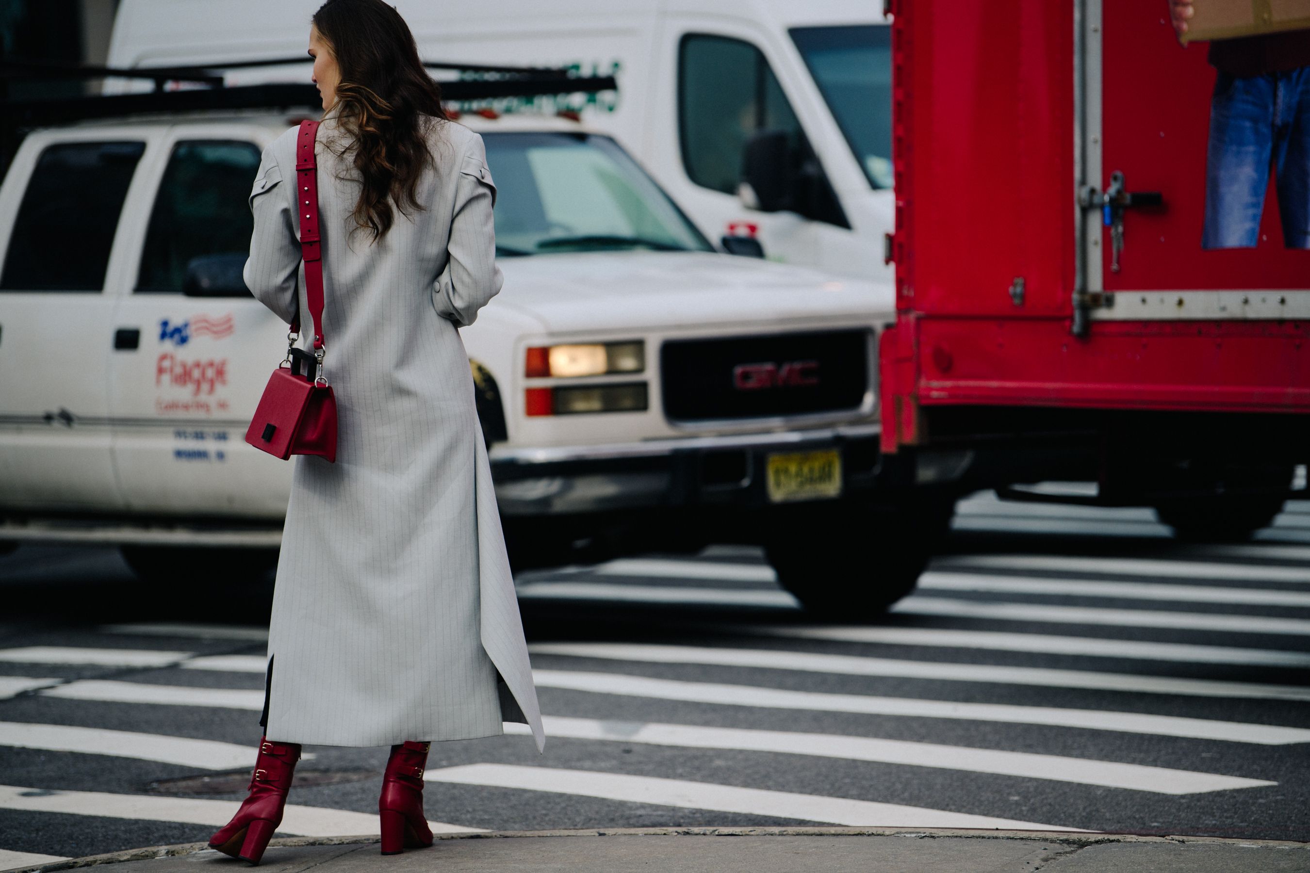 Woman wearing red heeled boots