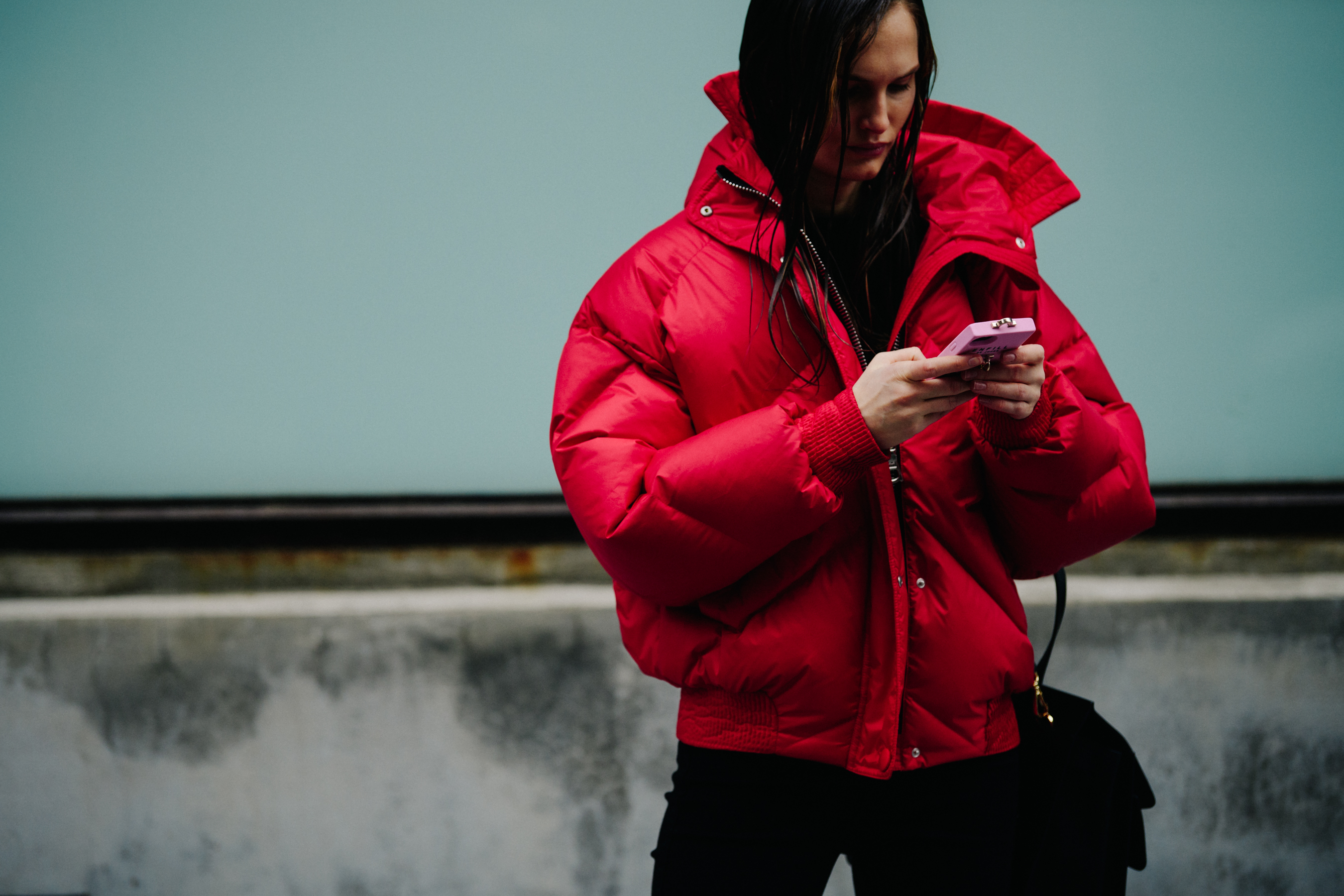 Model wearing red puffer coat