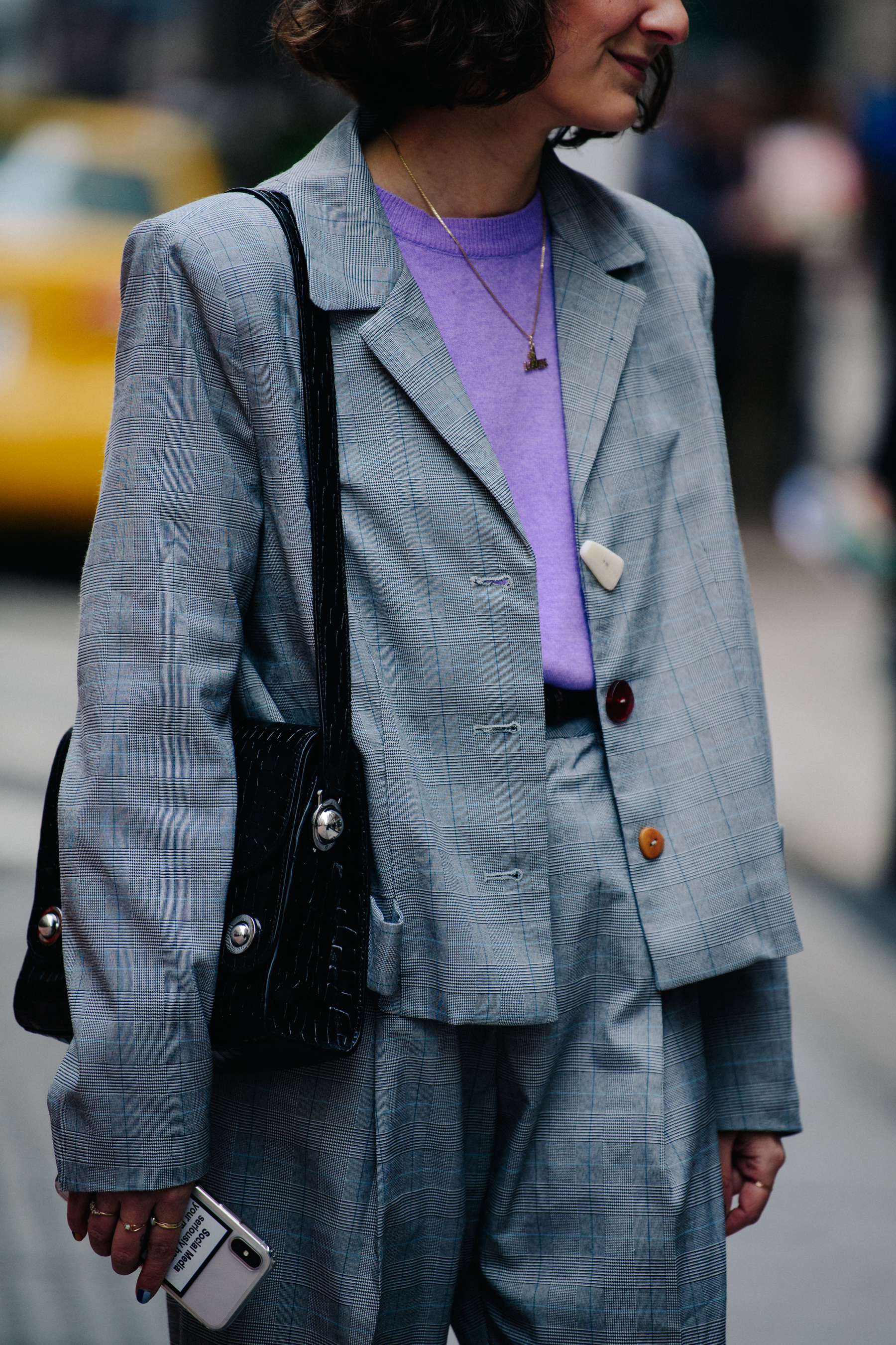 Woman wearing grey suit