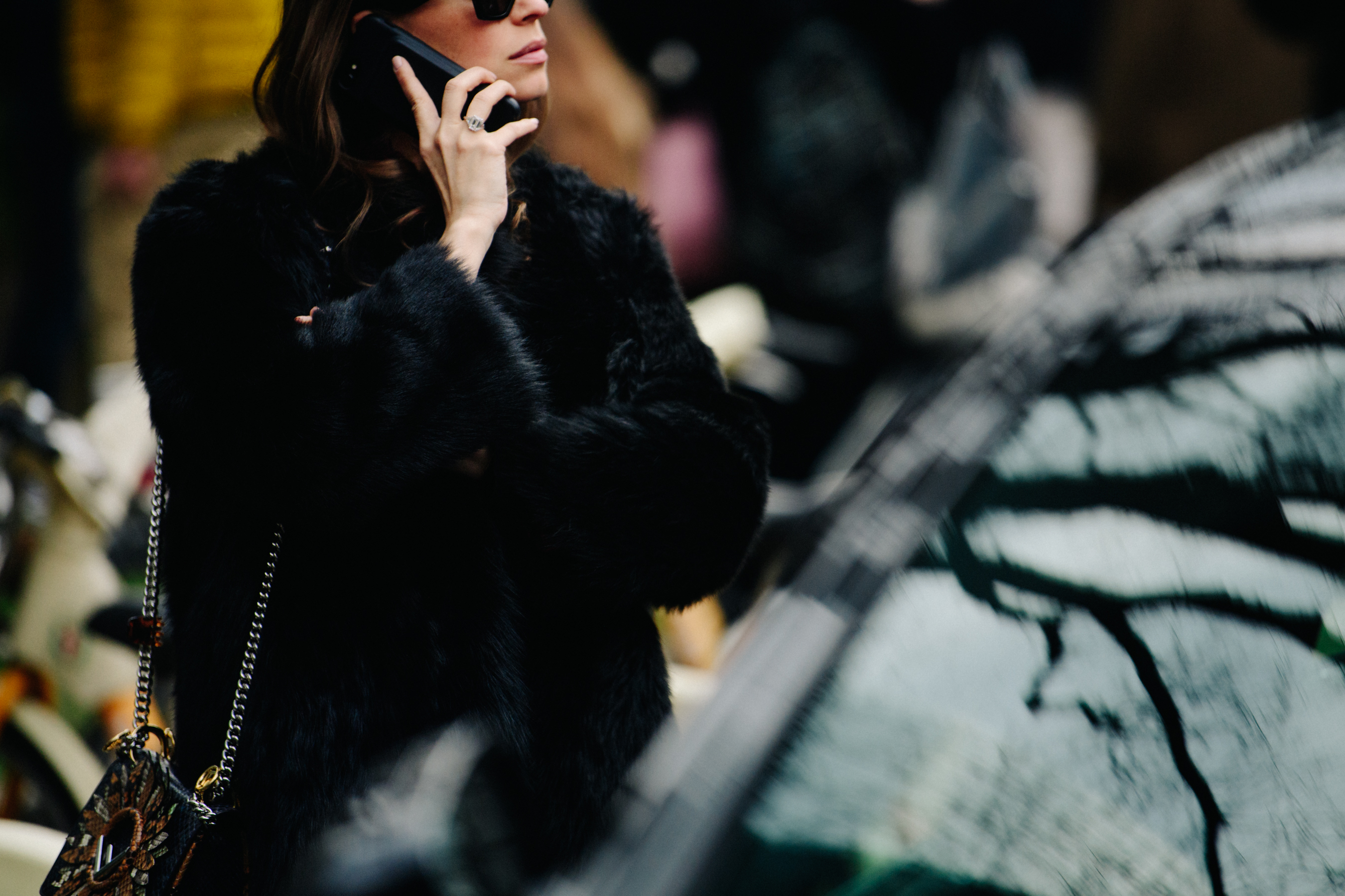 Woman wearing dark fur coat