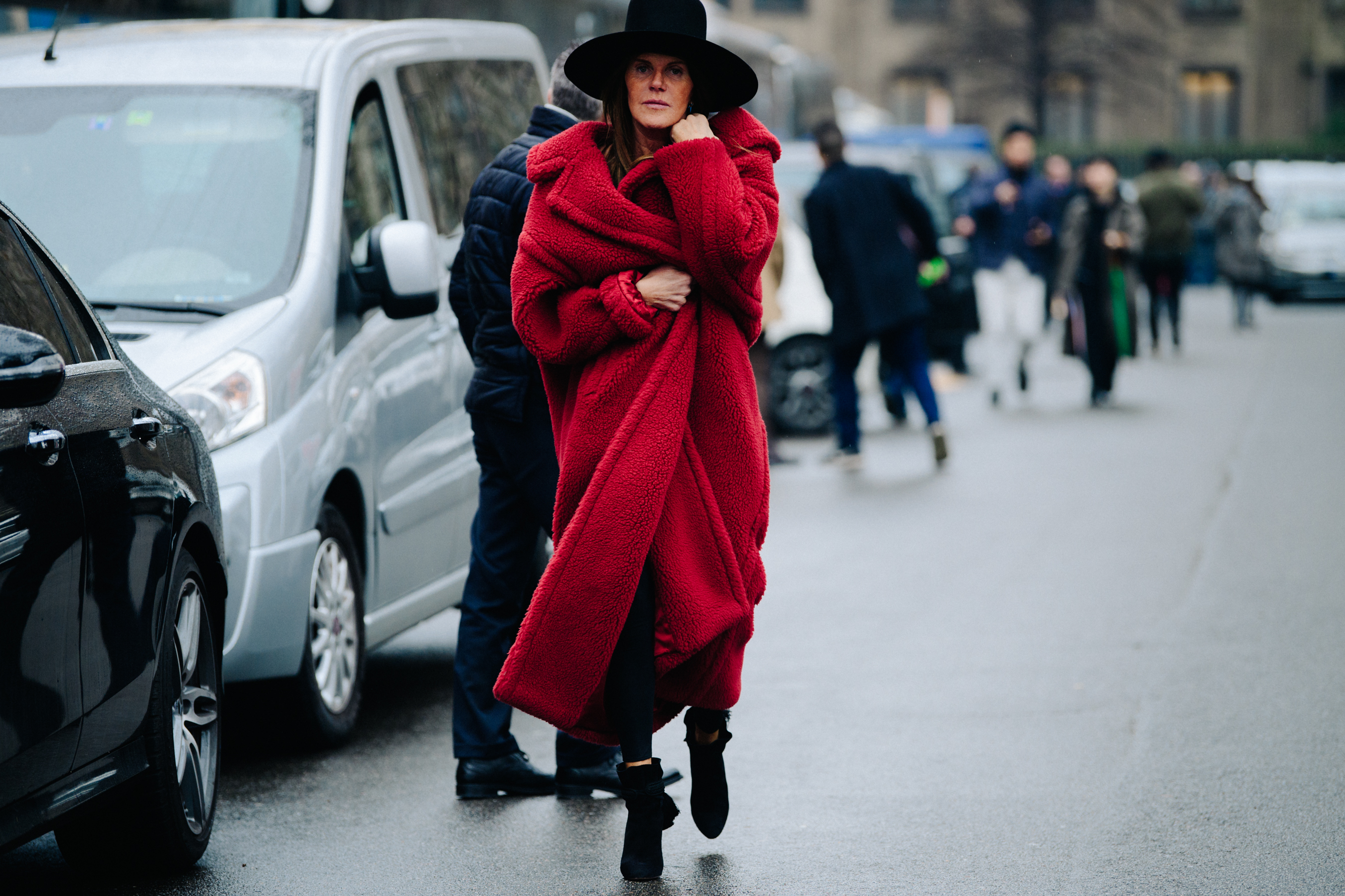 Italian editor wearing red fur coat