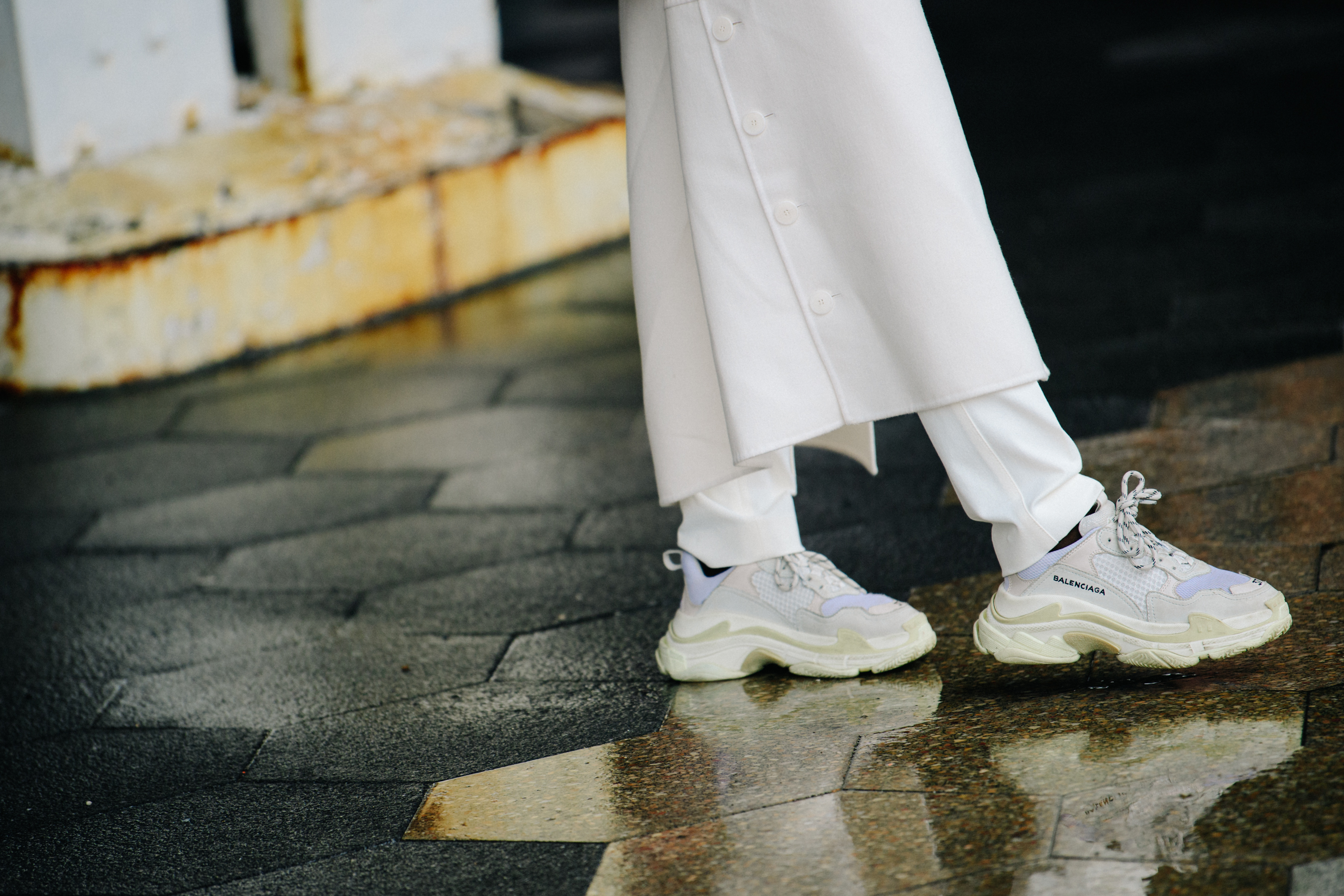 Women wearing white Balenciaga shoes
