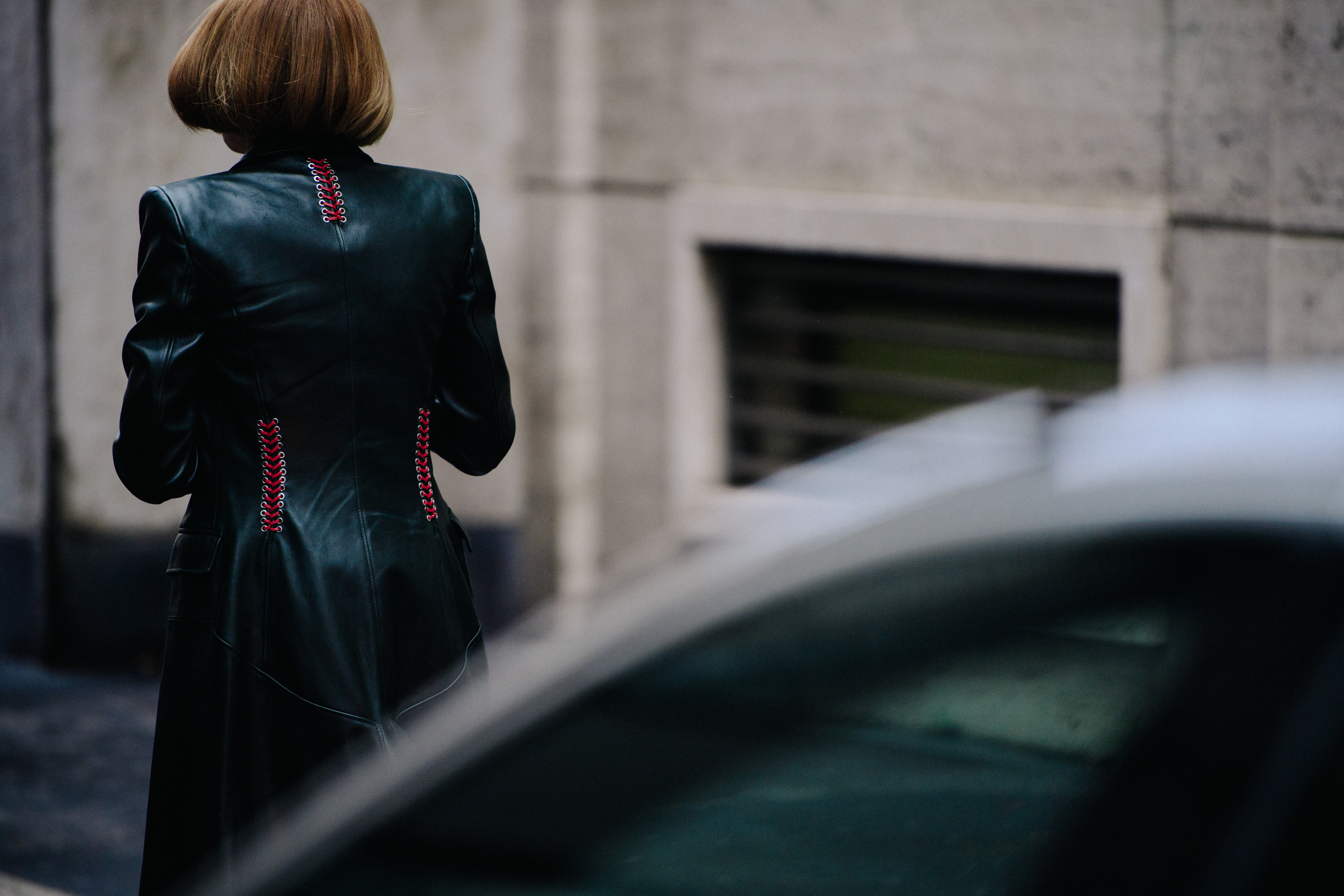 Editor wearing black leather coat