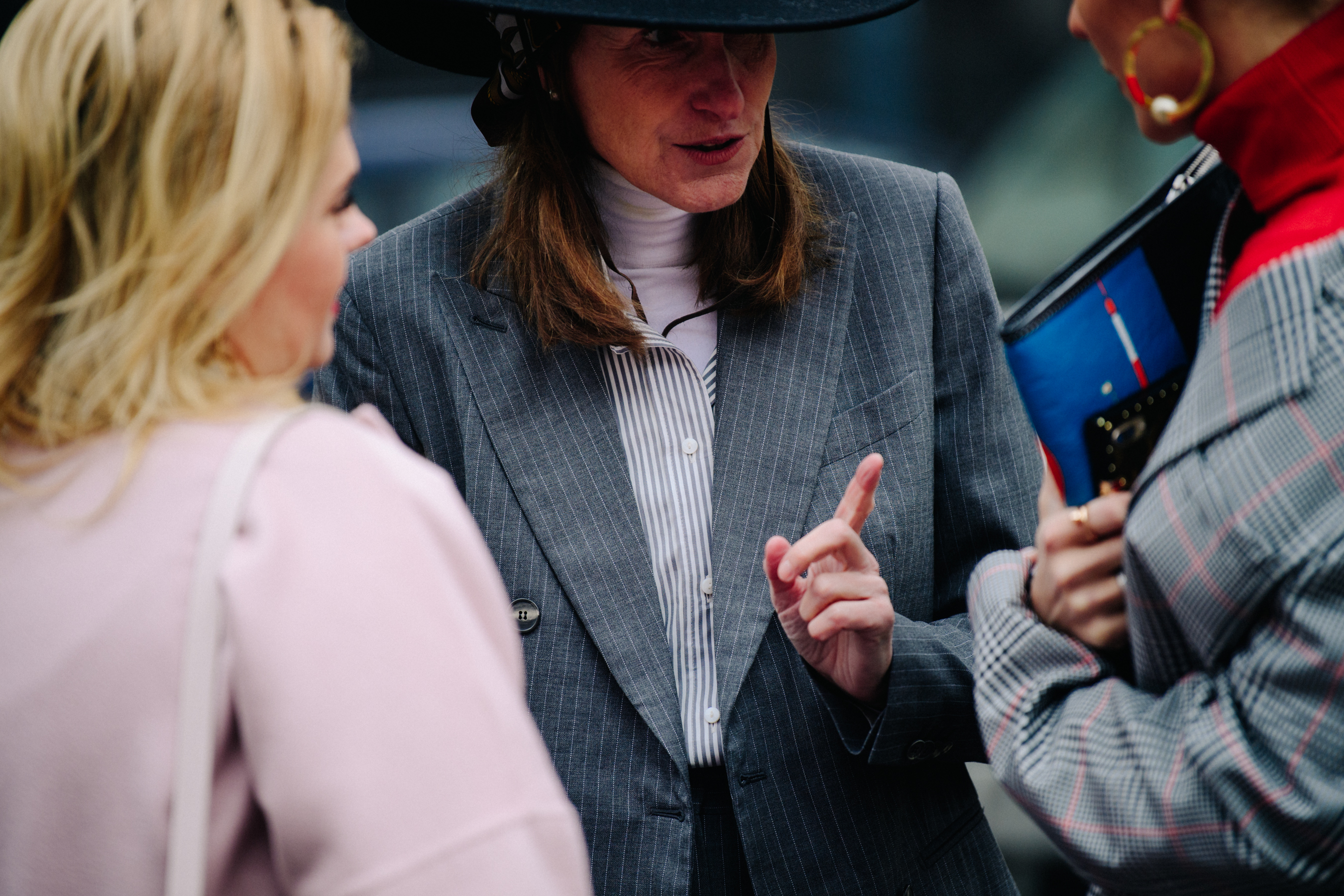 Woman wearing grey suit