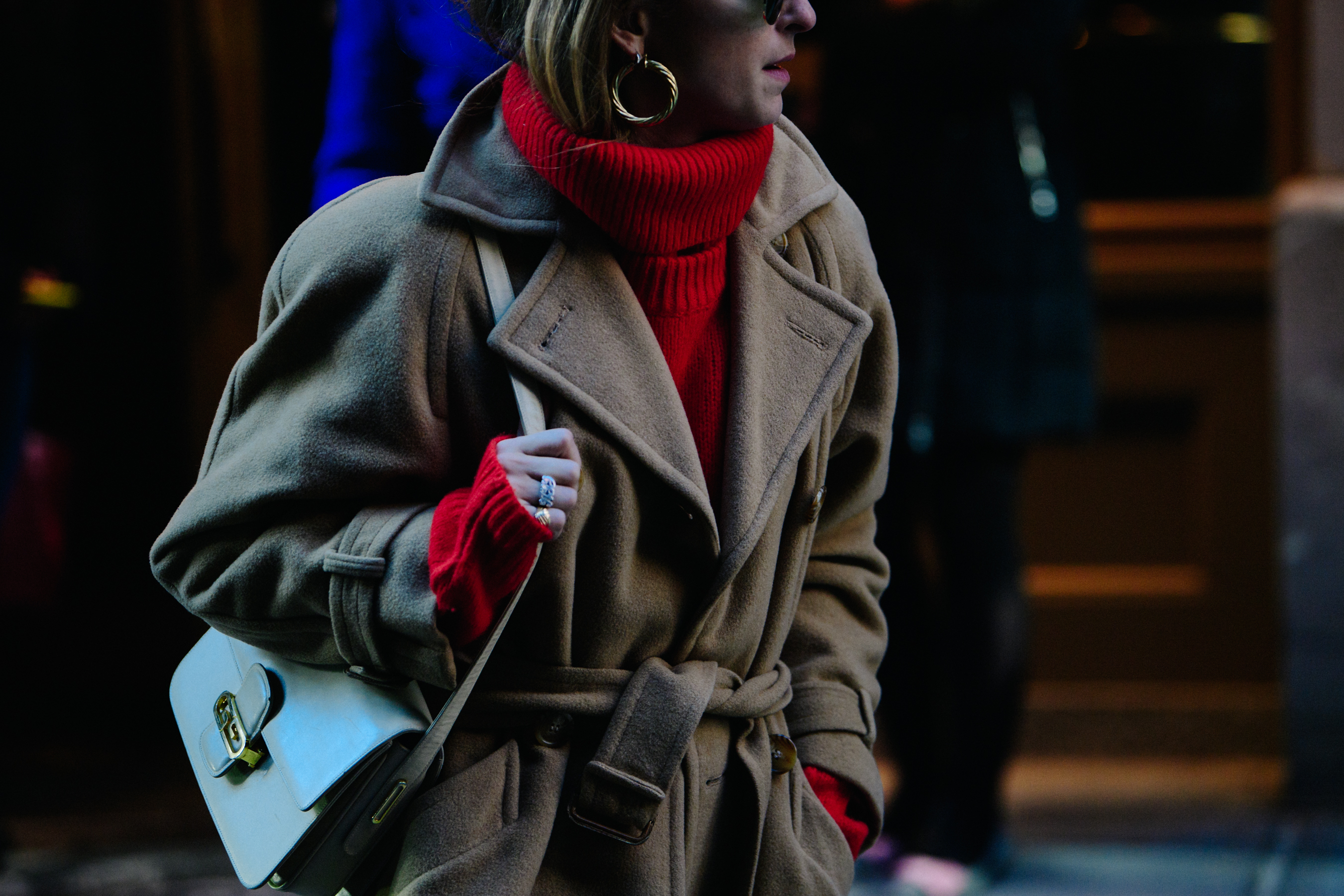 Woman wearing red knit jumper