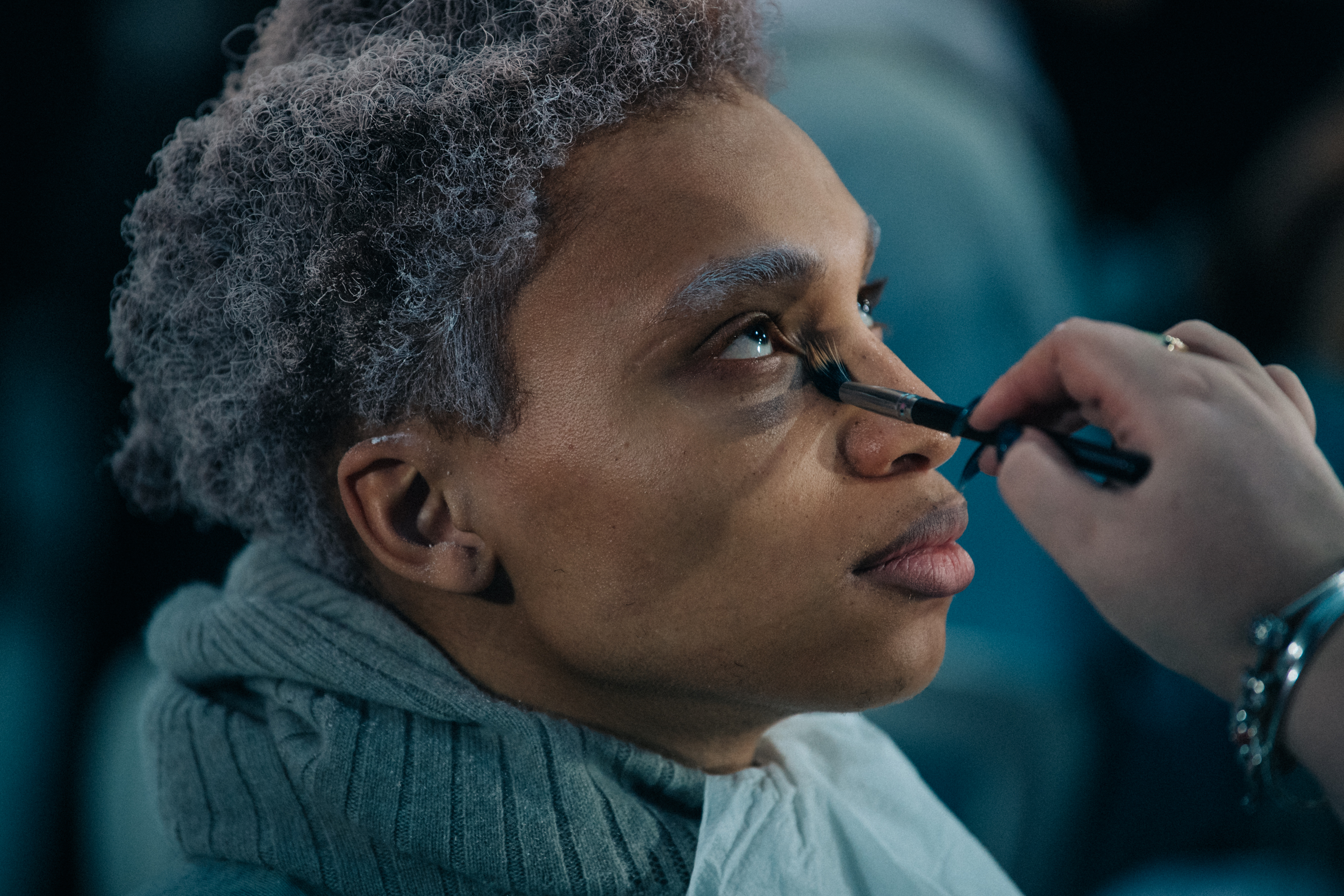 Model having makeup applied