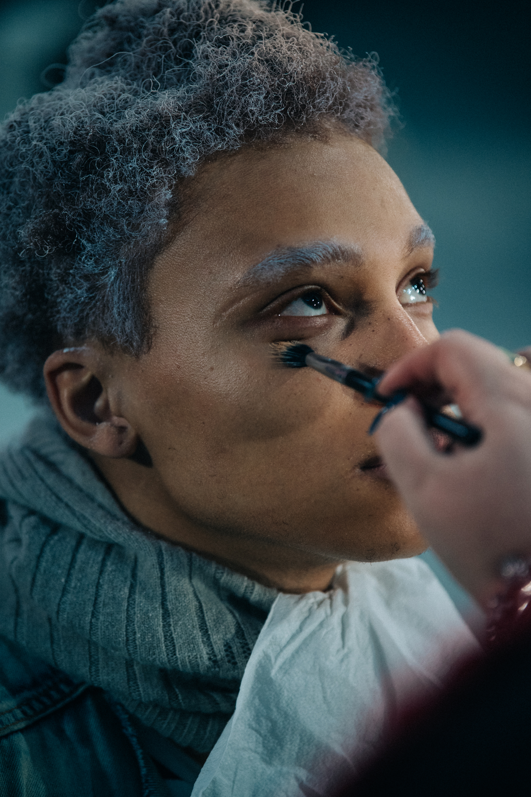 Model having makeup applied