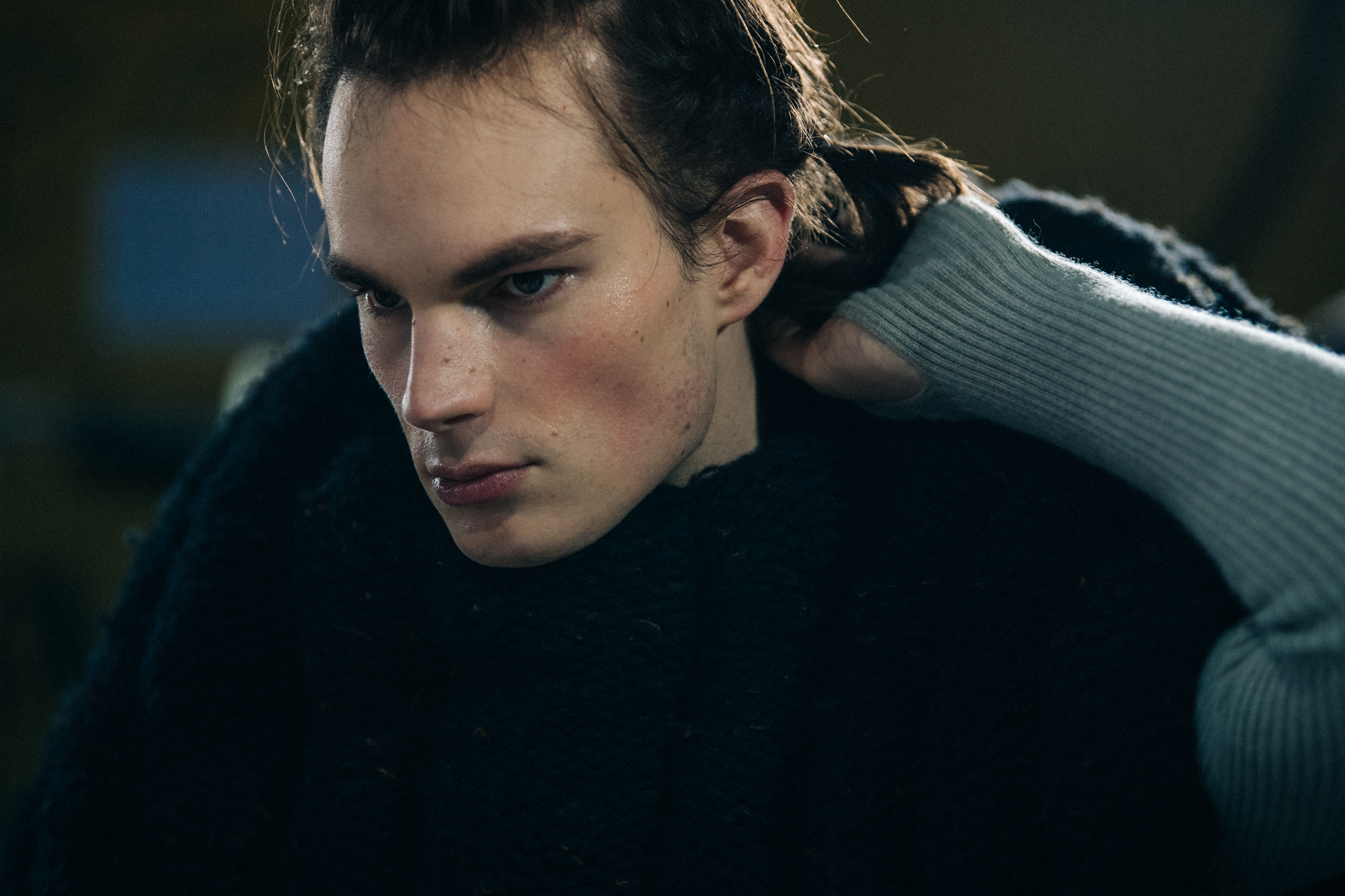 Model wearing grey wool jumper