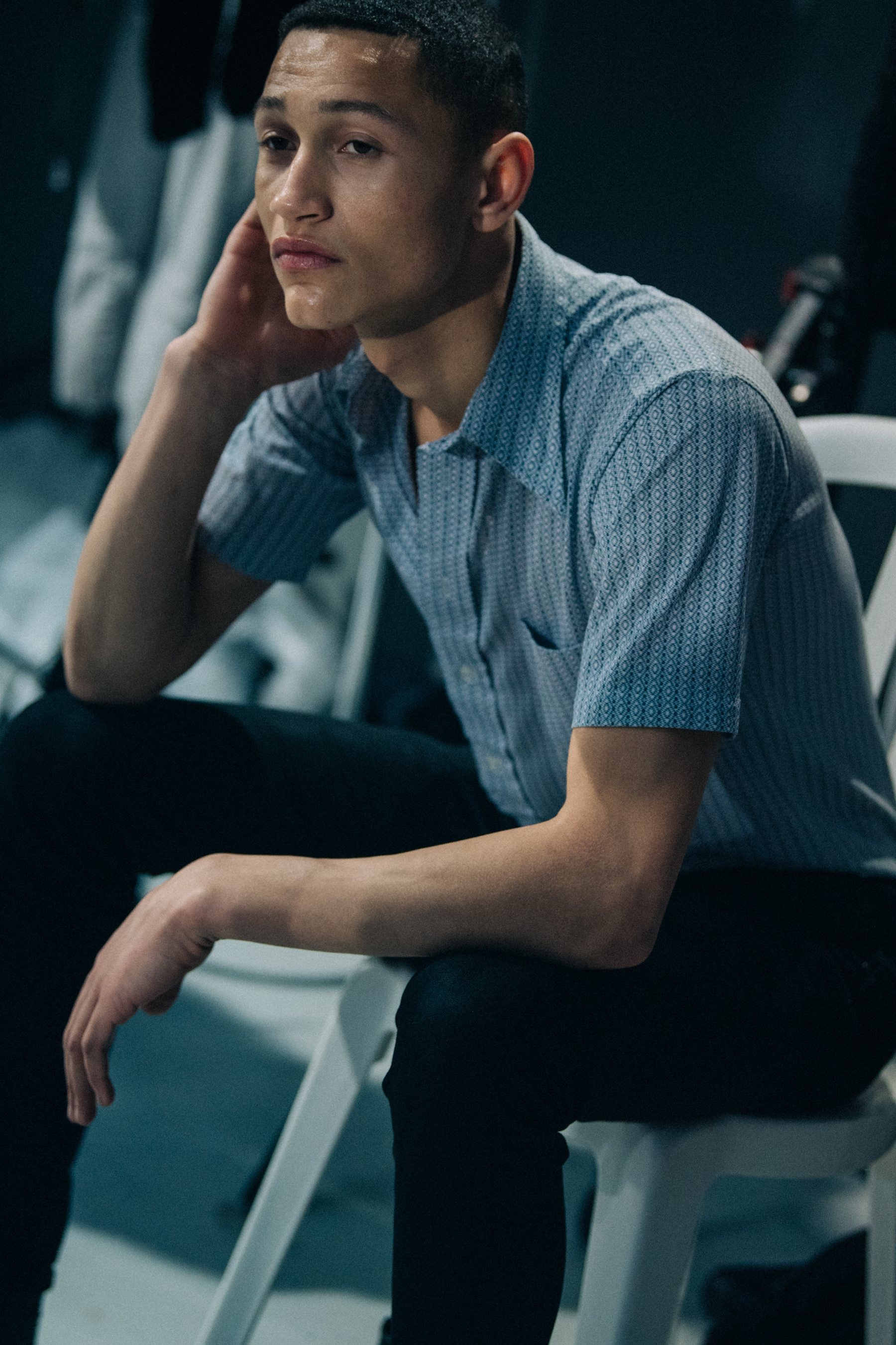 Model wearing blue shirt