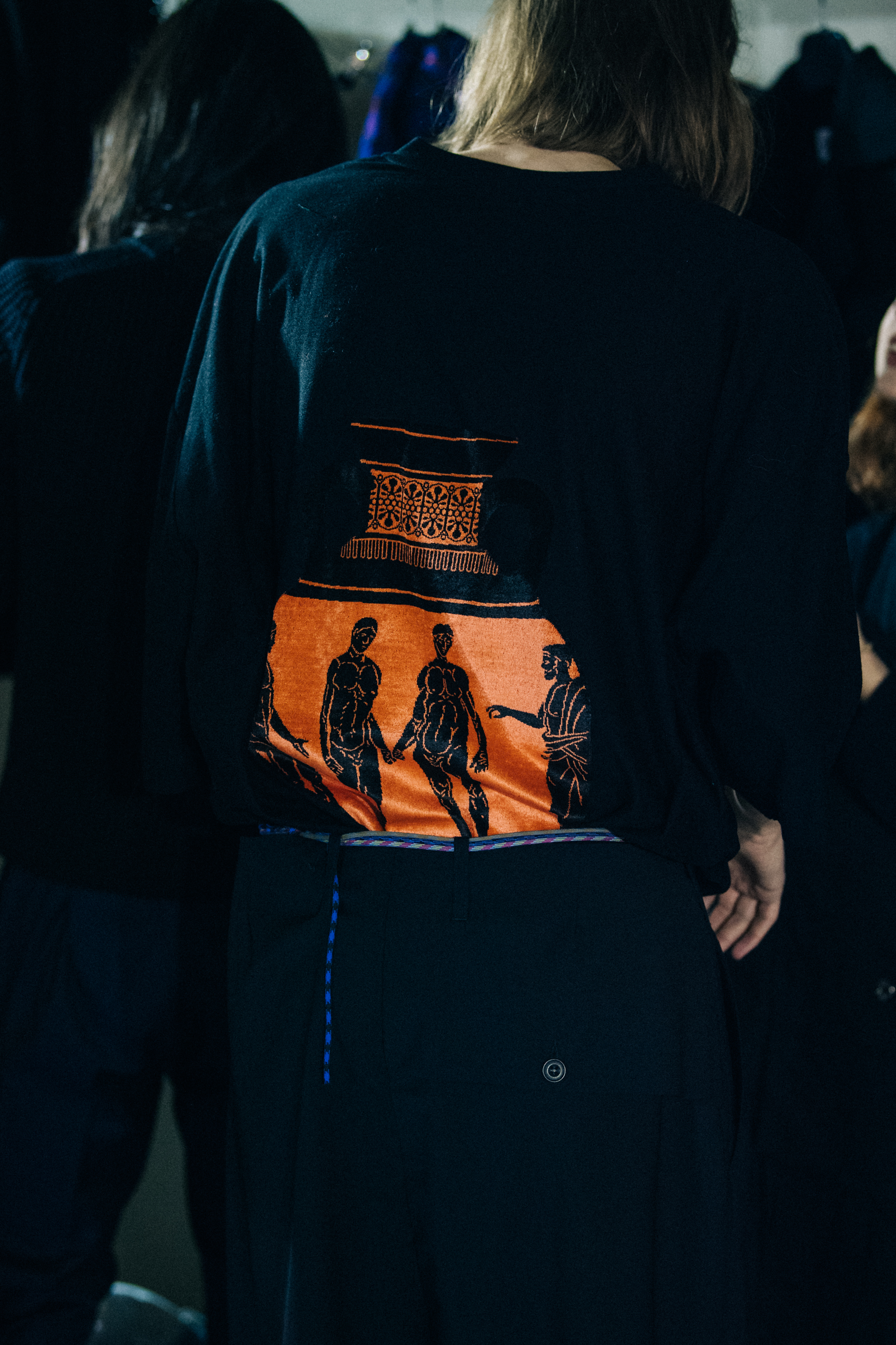 Model wearing Greek printed tee shirt
