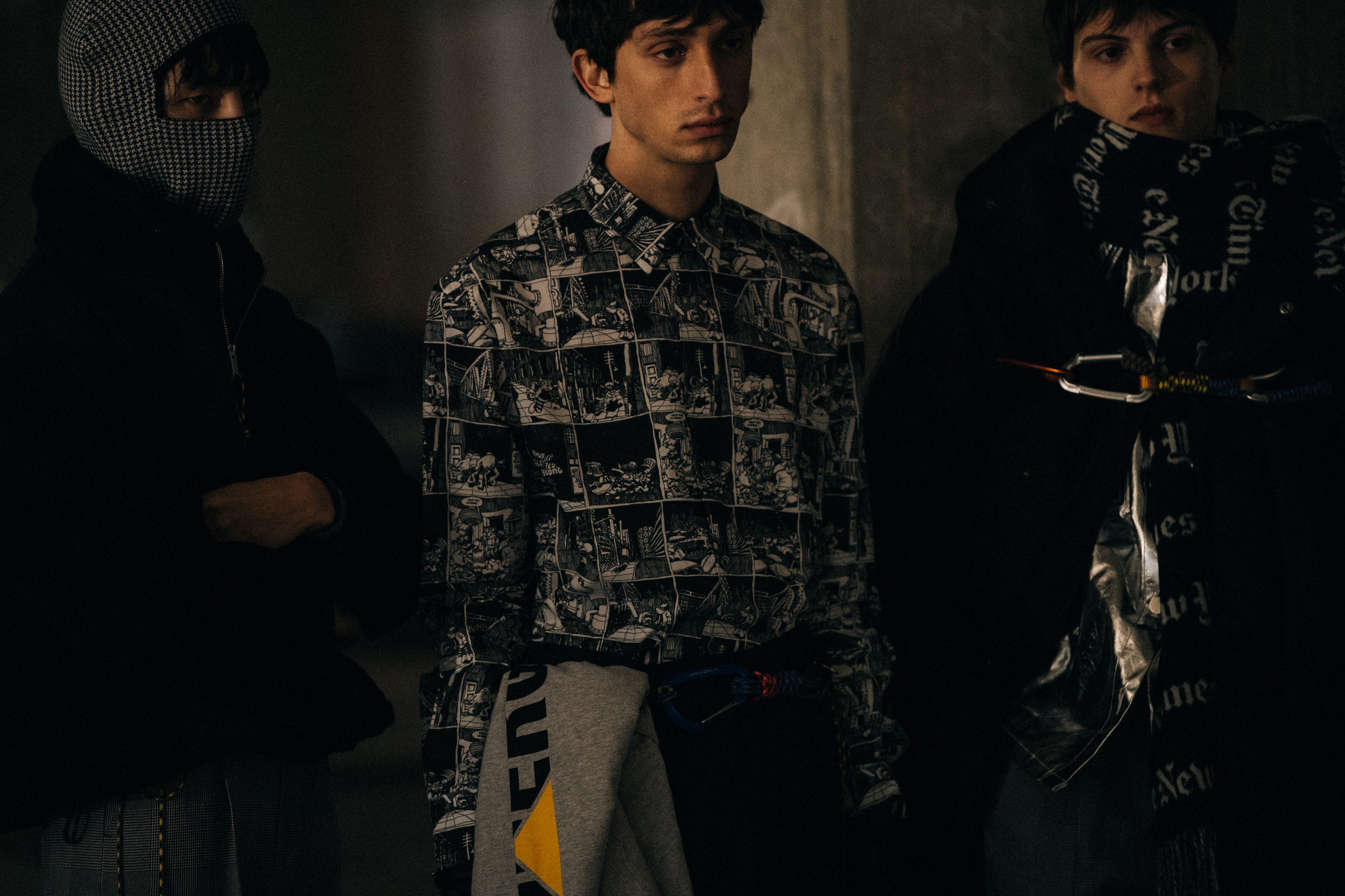 Model wearing printed graphic shirt