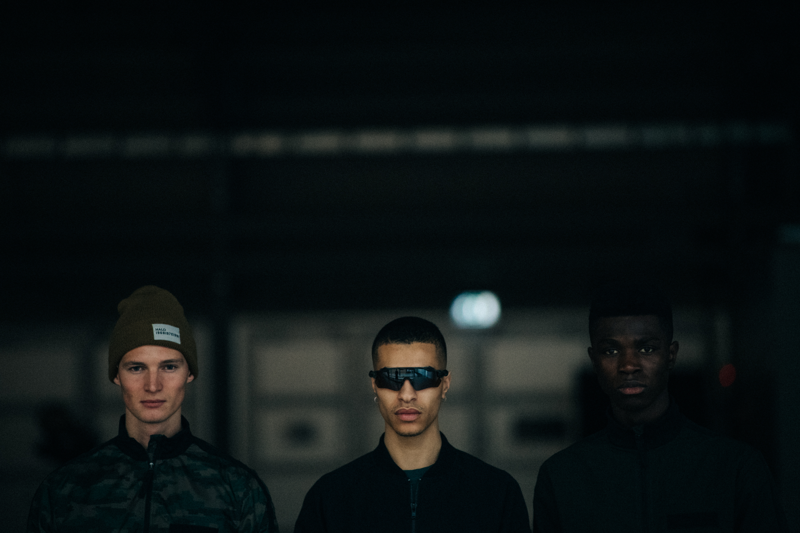 Three models backstage at HALO show