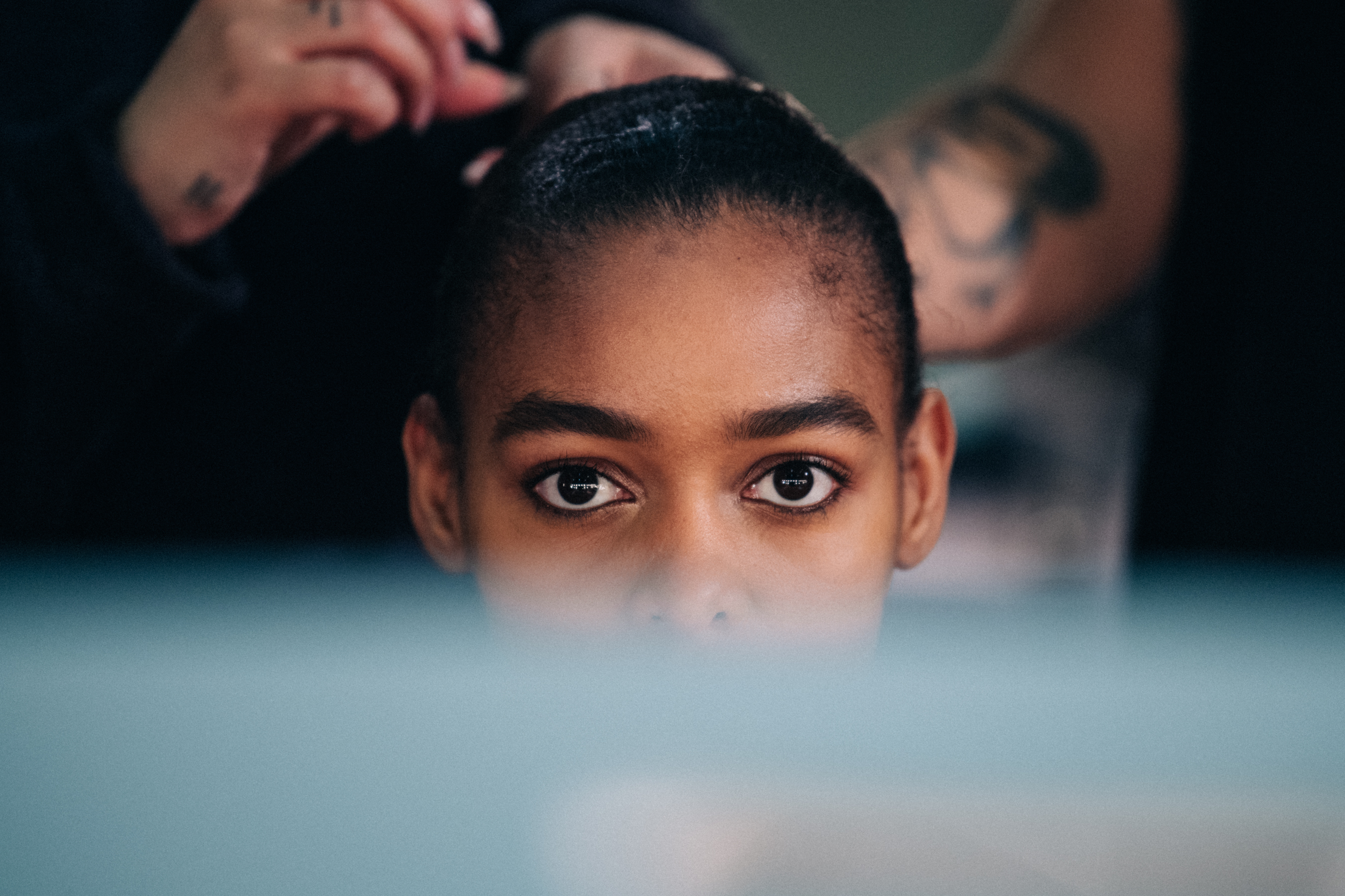 Model in hair and makeup at JW Anderson