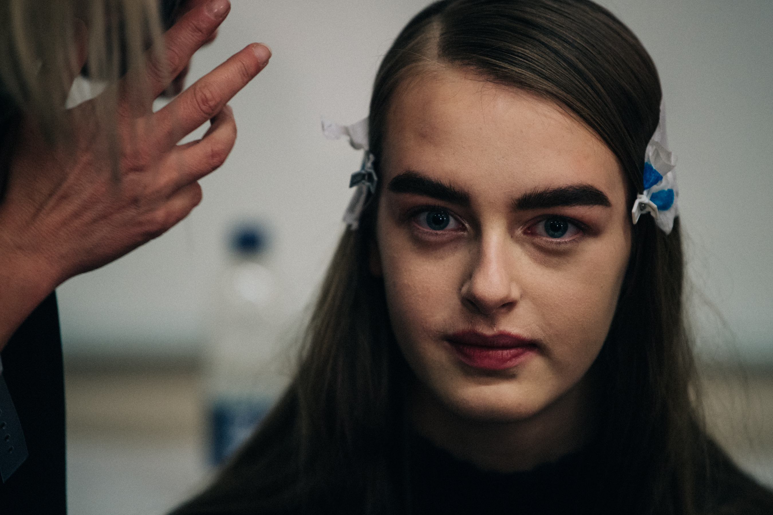 Model in hair and makeup at JW Anderson