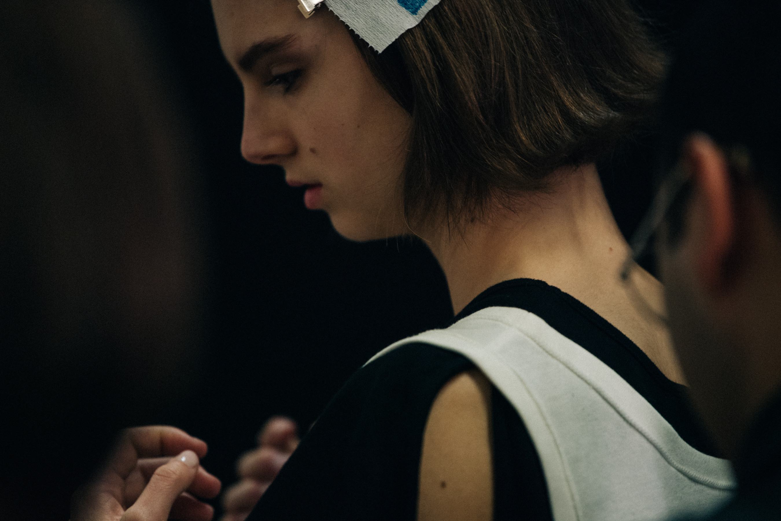Model in hair and makeup at JW Anderson