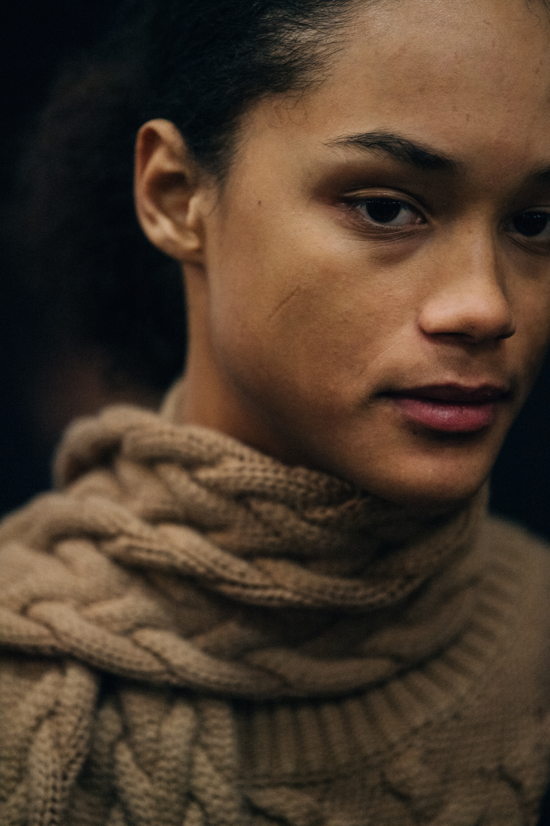 Model wearing brown knit jumper