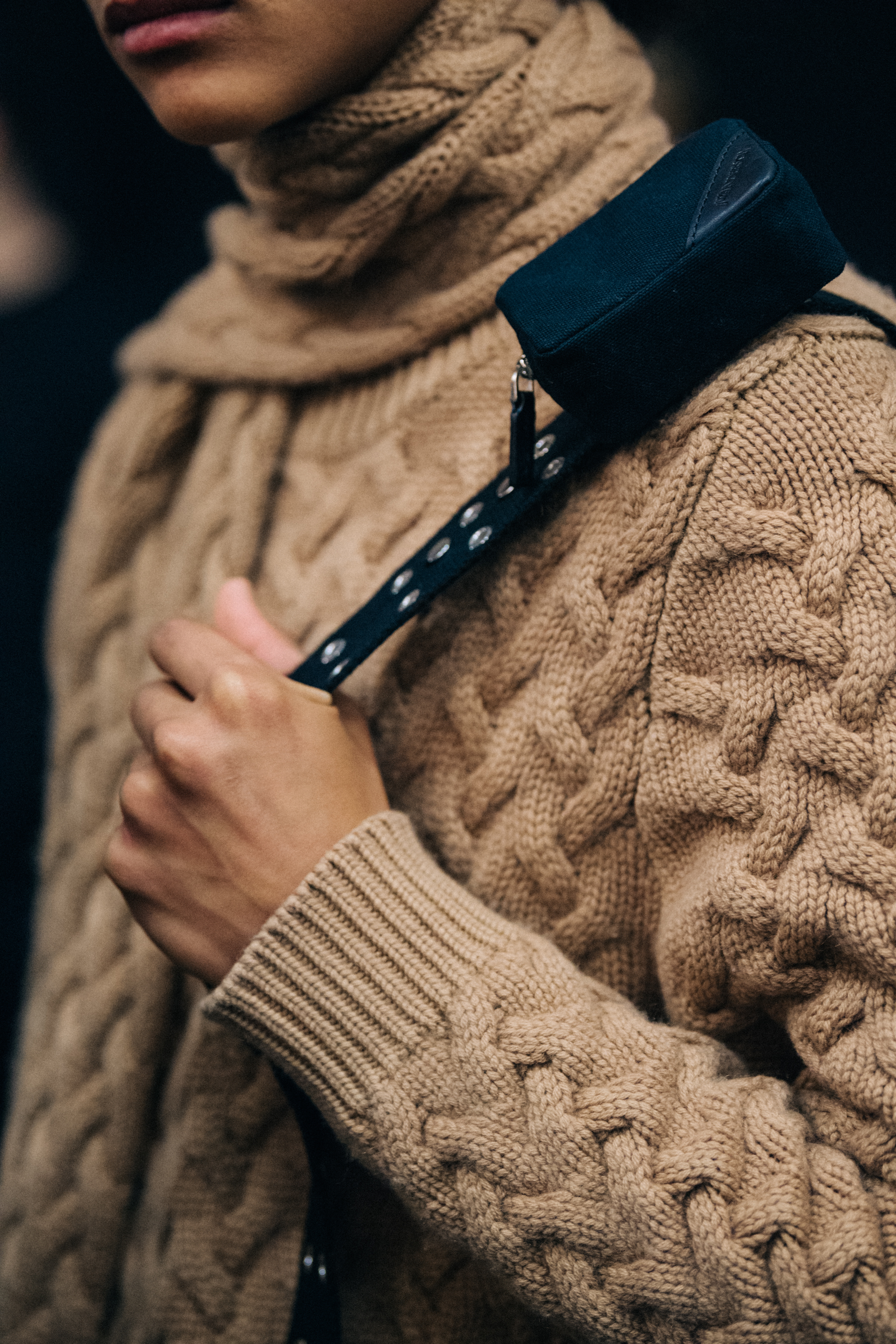 Model wearing brown knit jumper