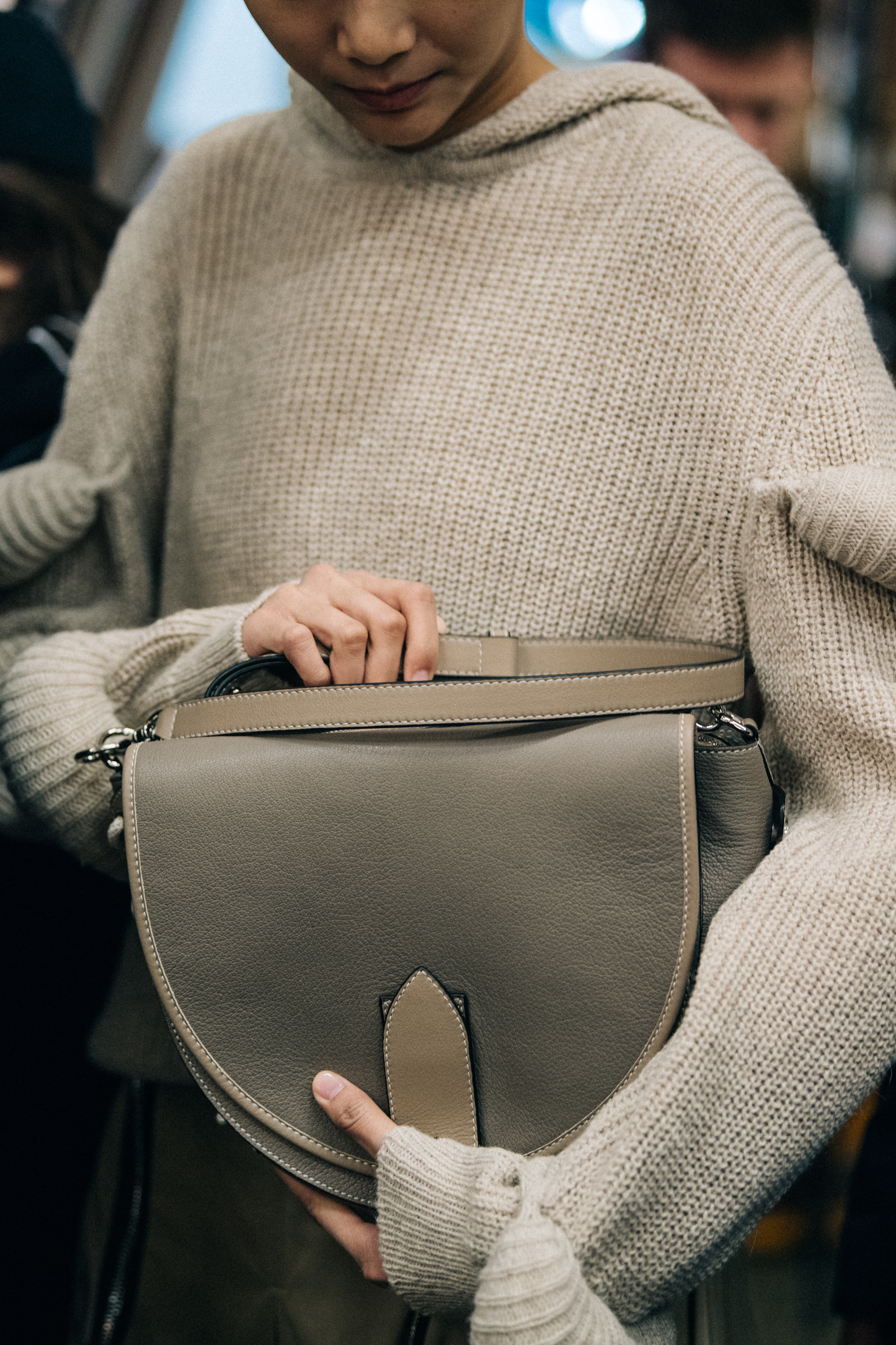 Model wearing JW Anderson knit jumper