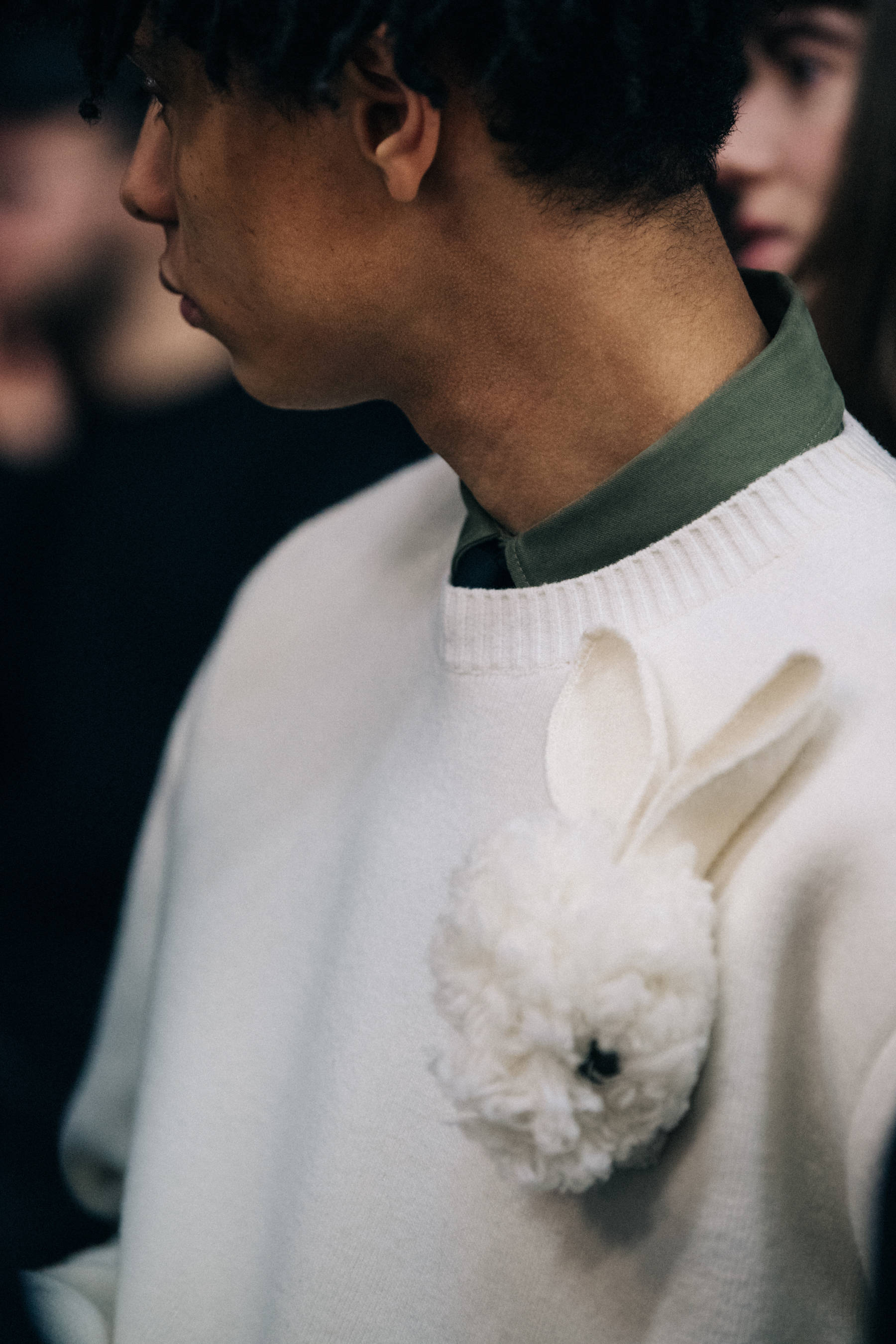 Model wearing JW Anderson knit jumper