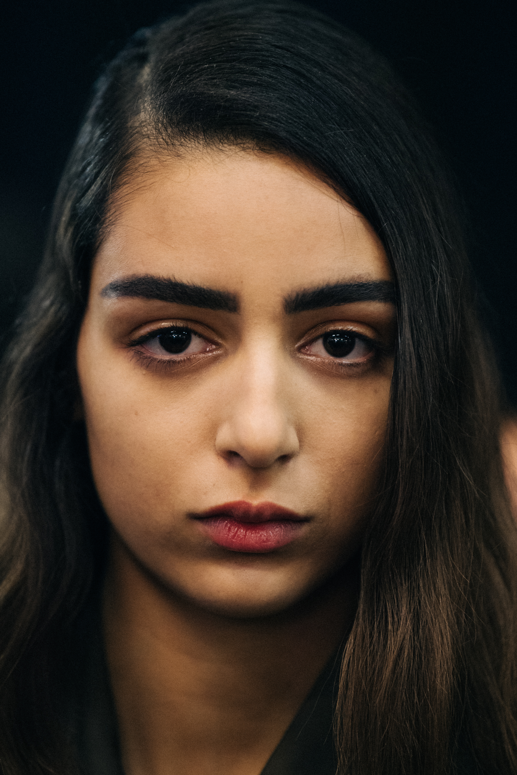 Portrait of model with long dark hair