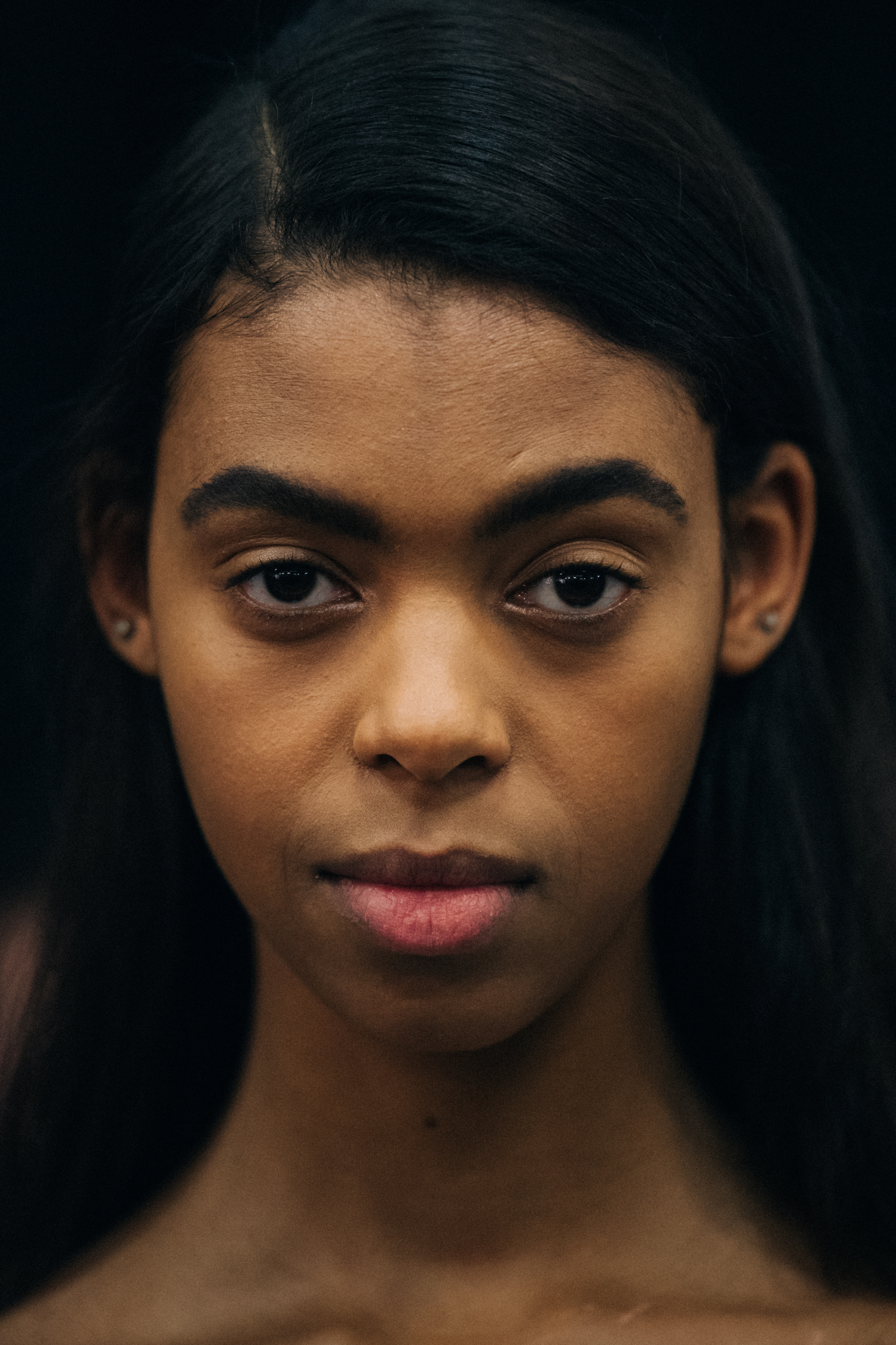Portrait of model with long dark hair