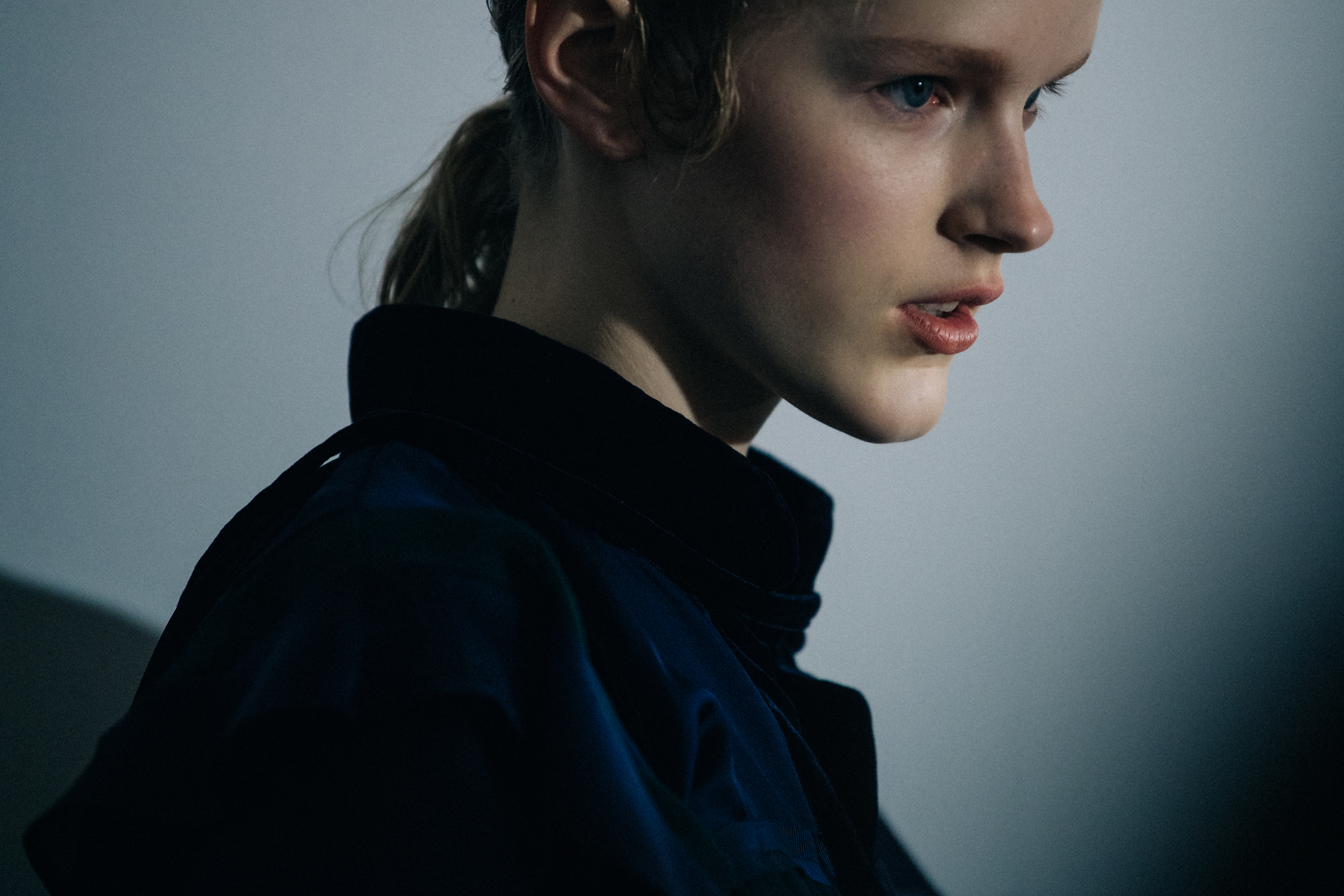 Blonde model wearing blue