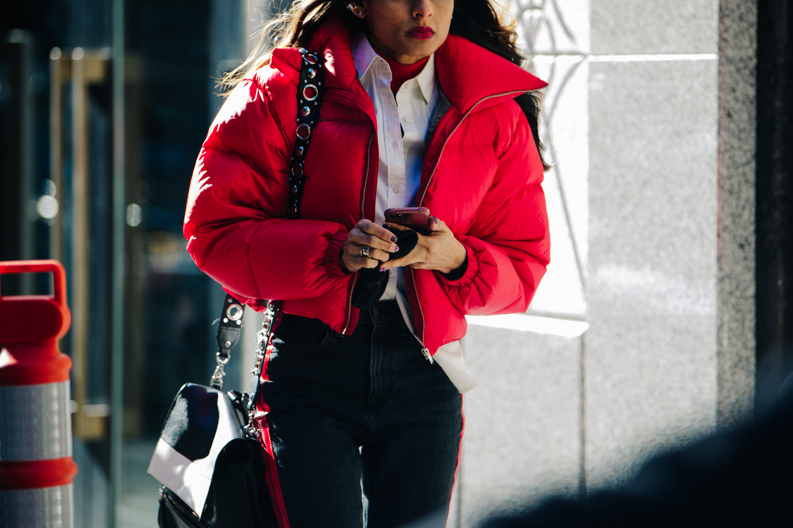Woman wearing red puffer jacket