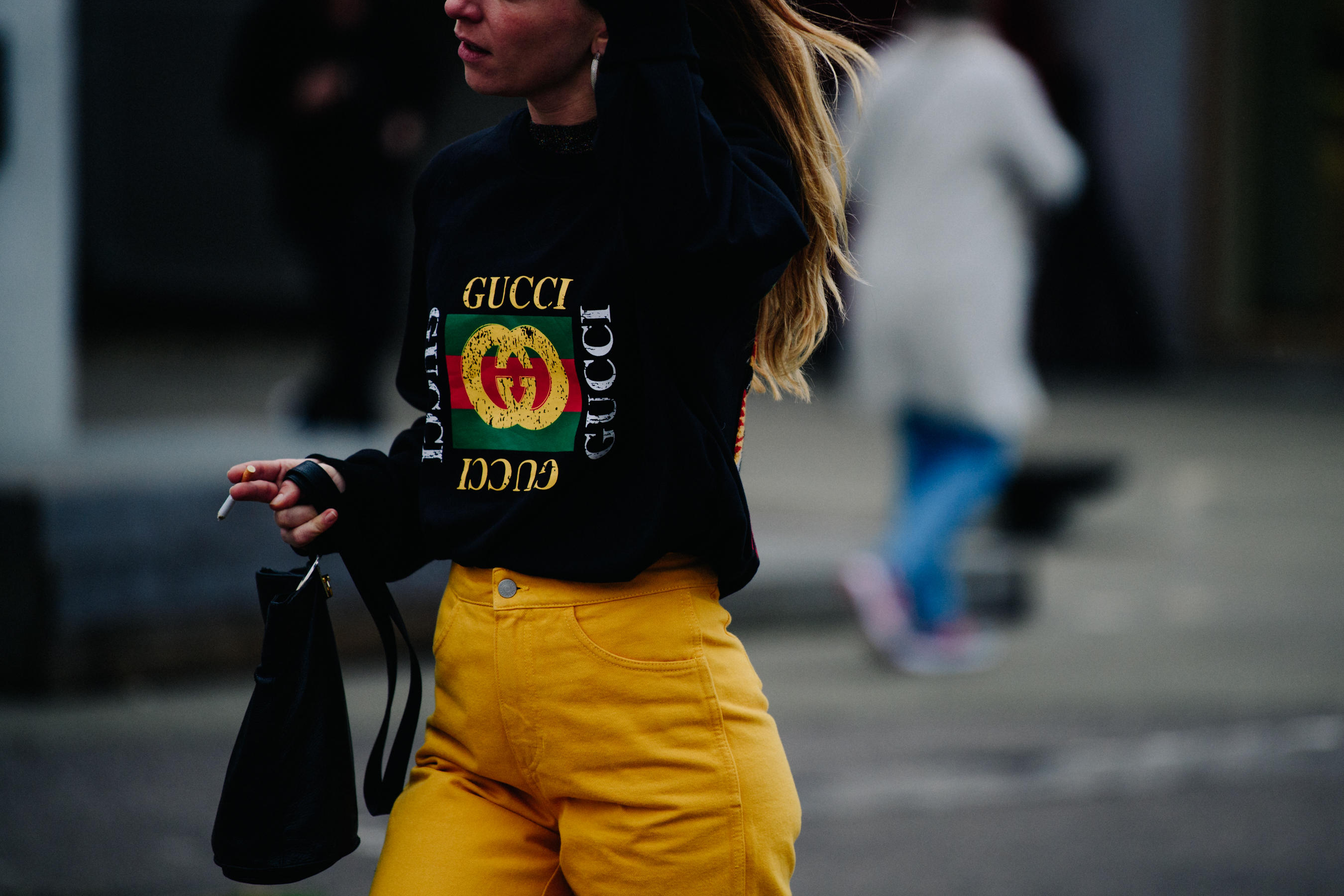Woman wearing Gucci tee shirt