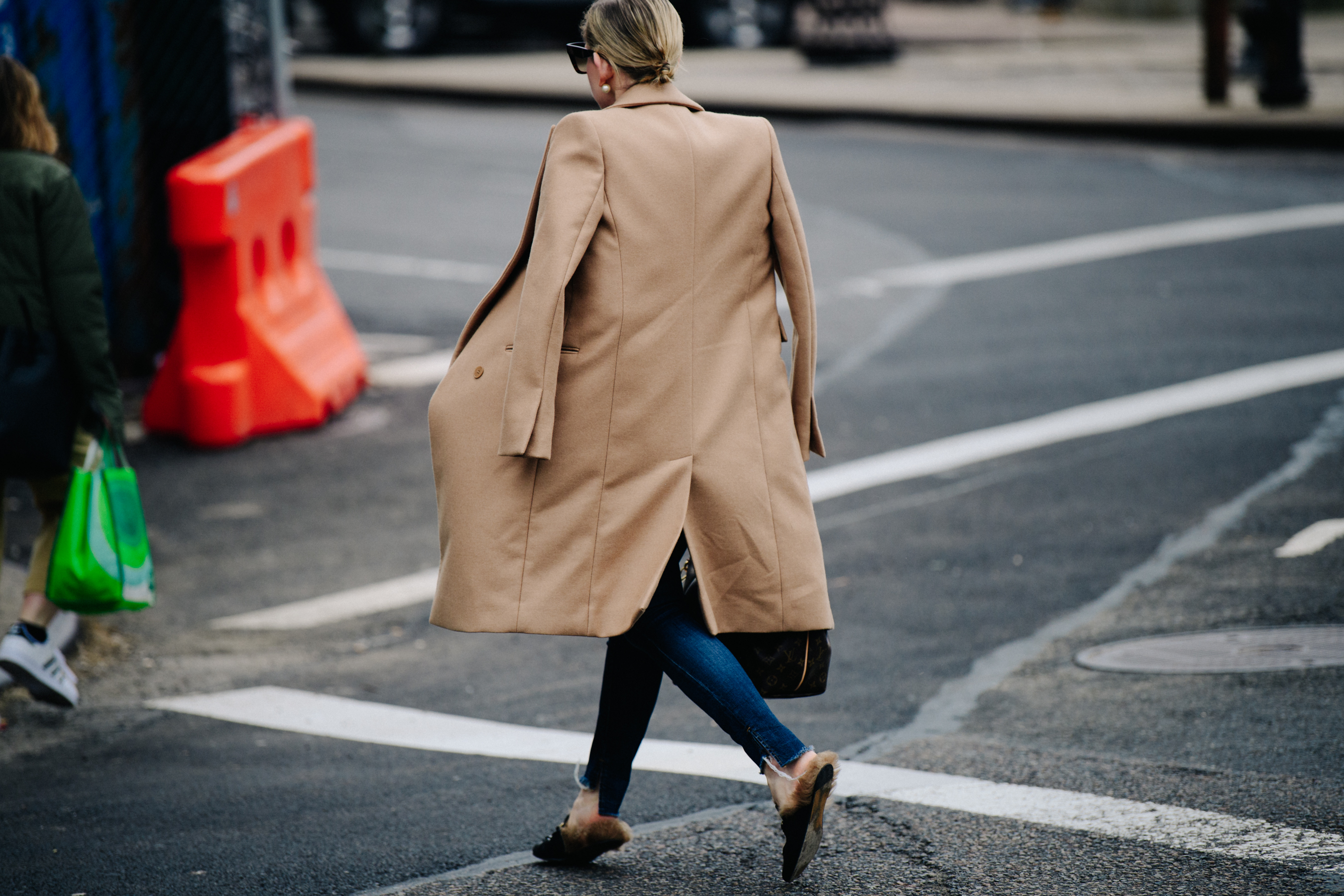 Woman wearing Gucci slippers