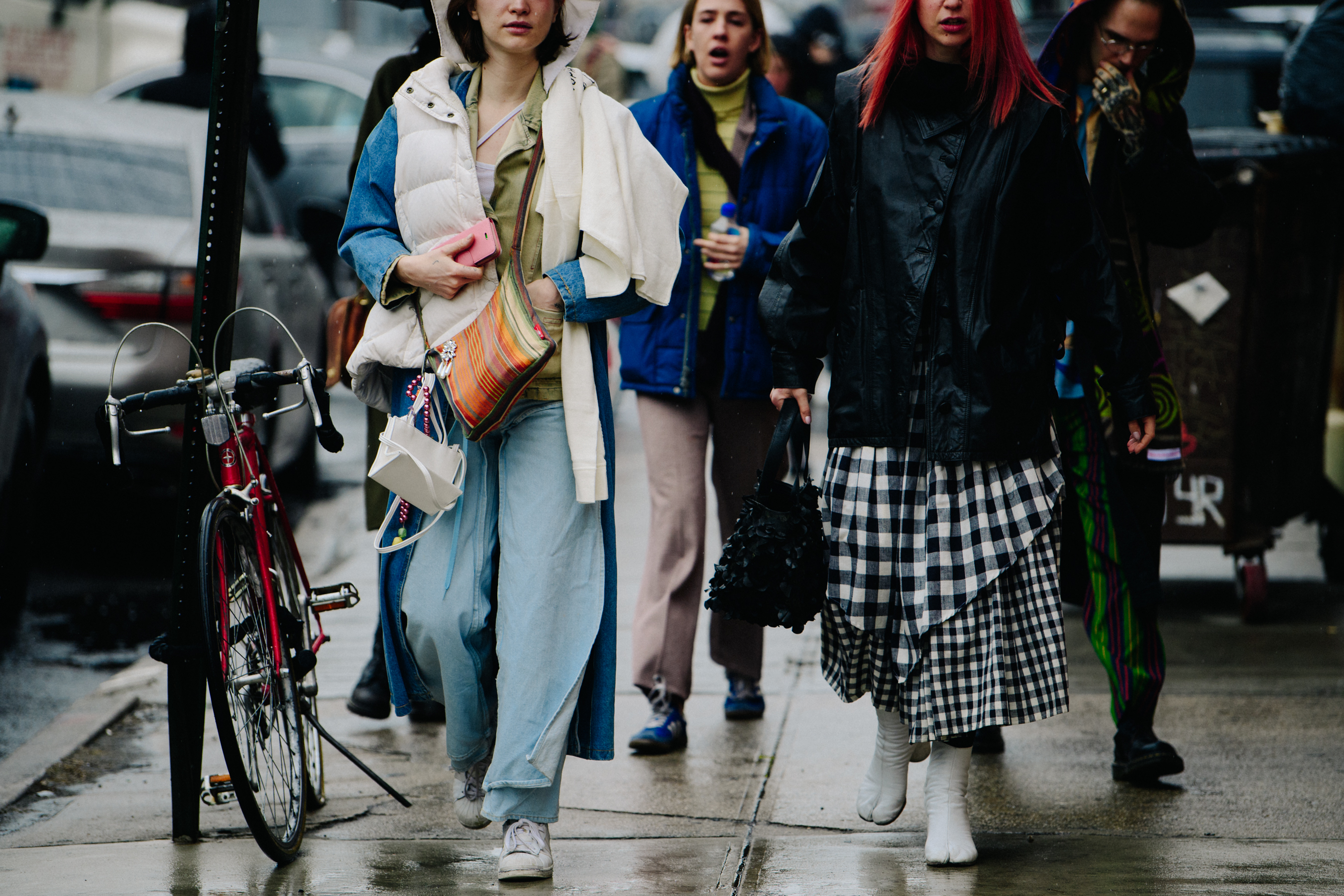 Group of women wearing light coloured clothing