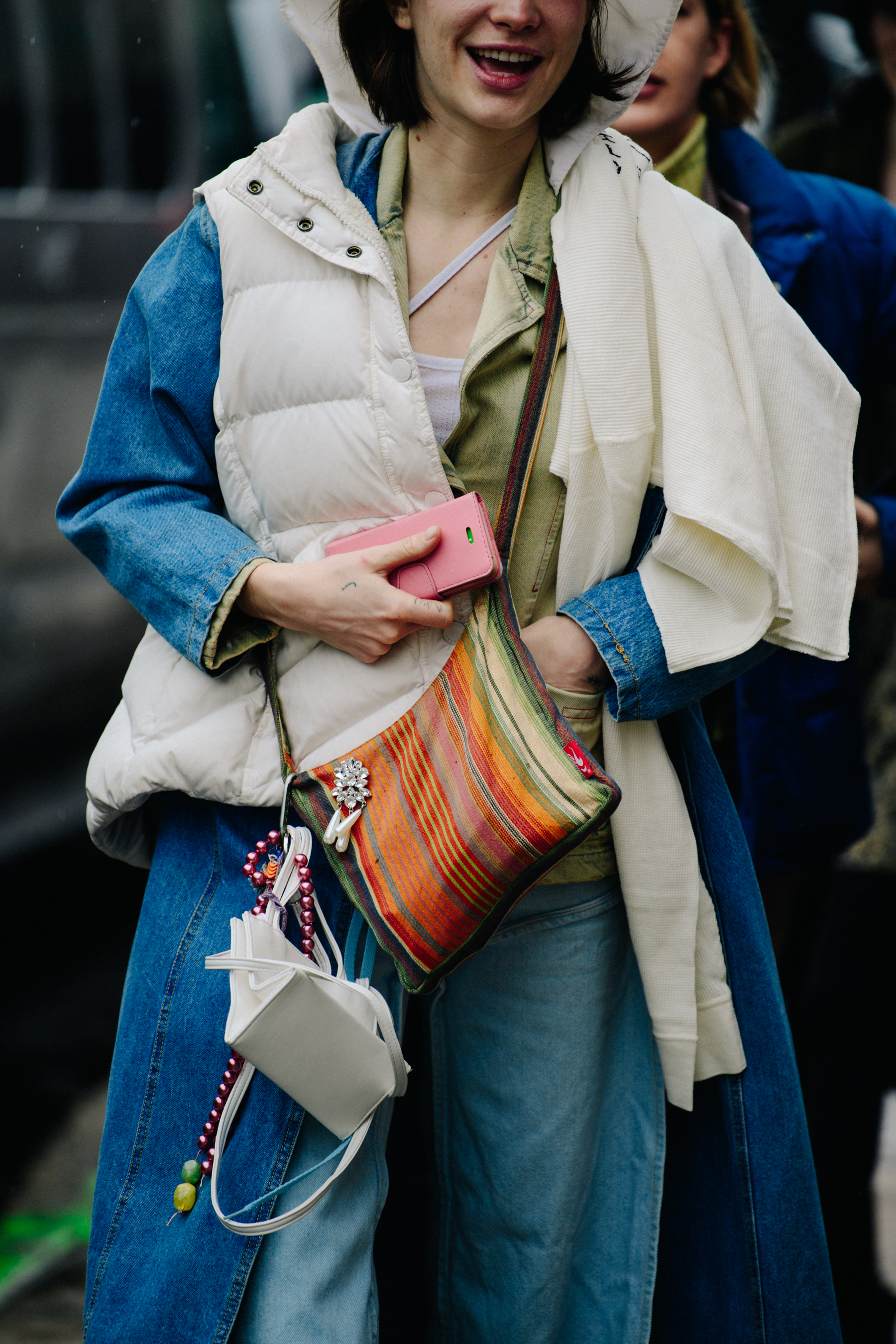 Woman wearing white puffer vest