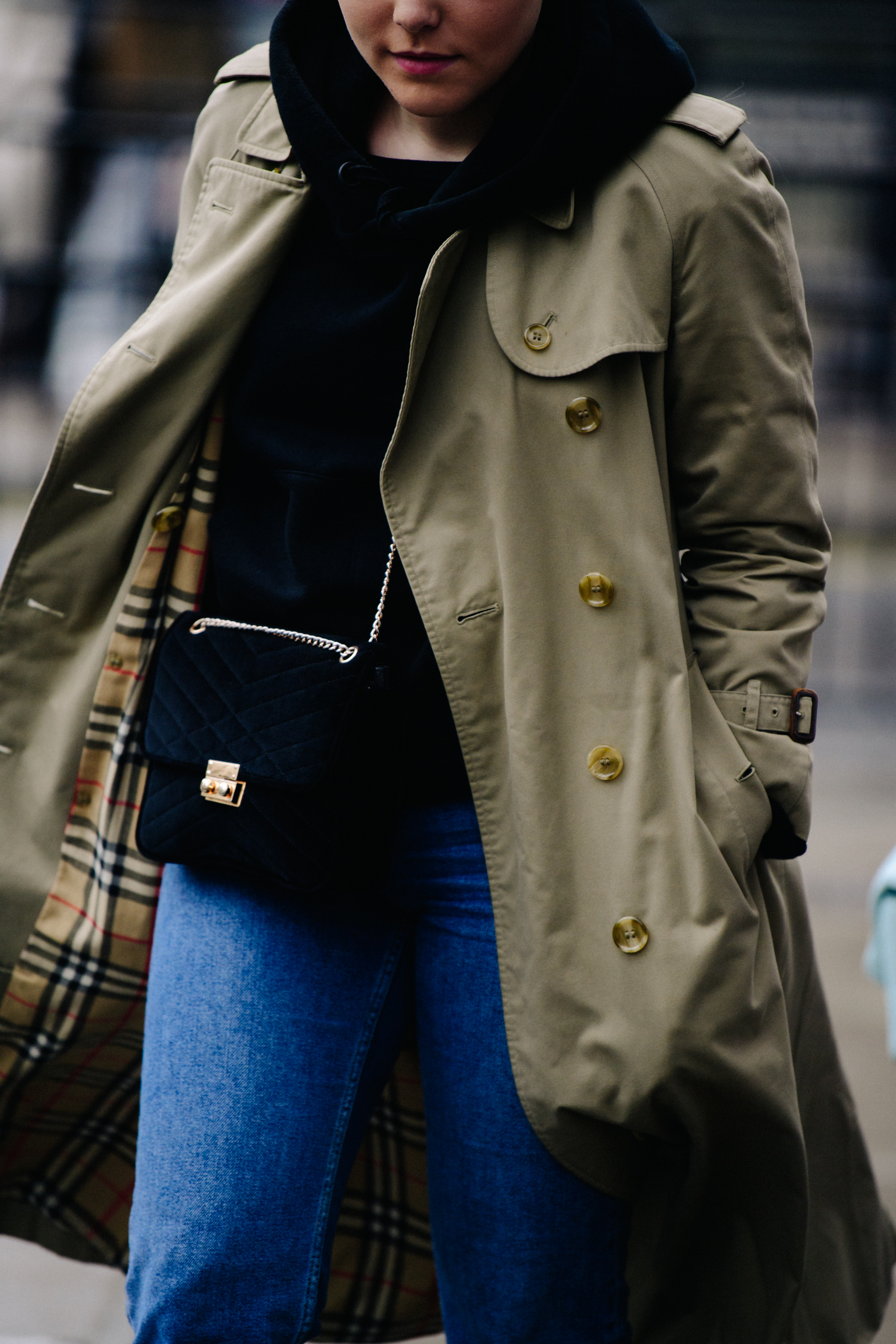 Woman wearing long tan coat