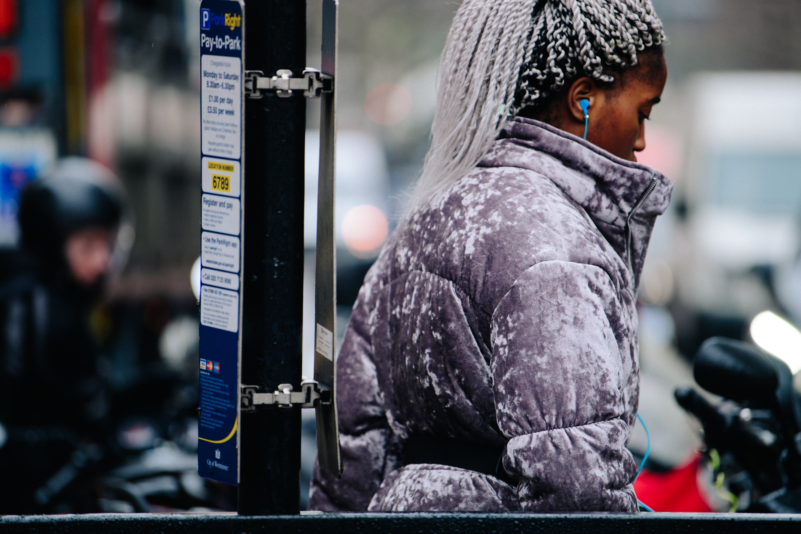 Woman wearing purple velvet coat