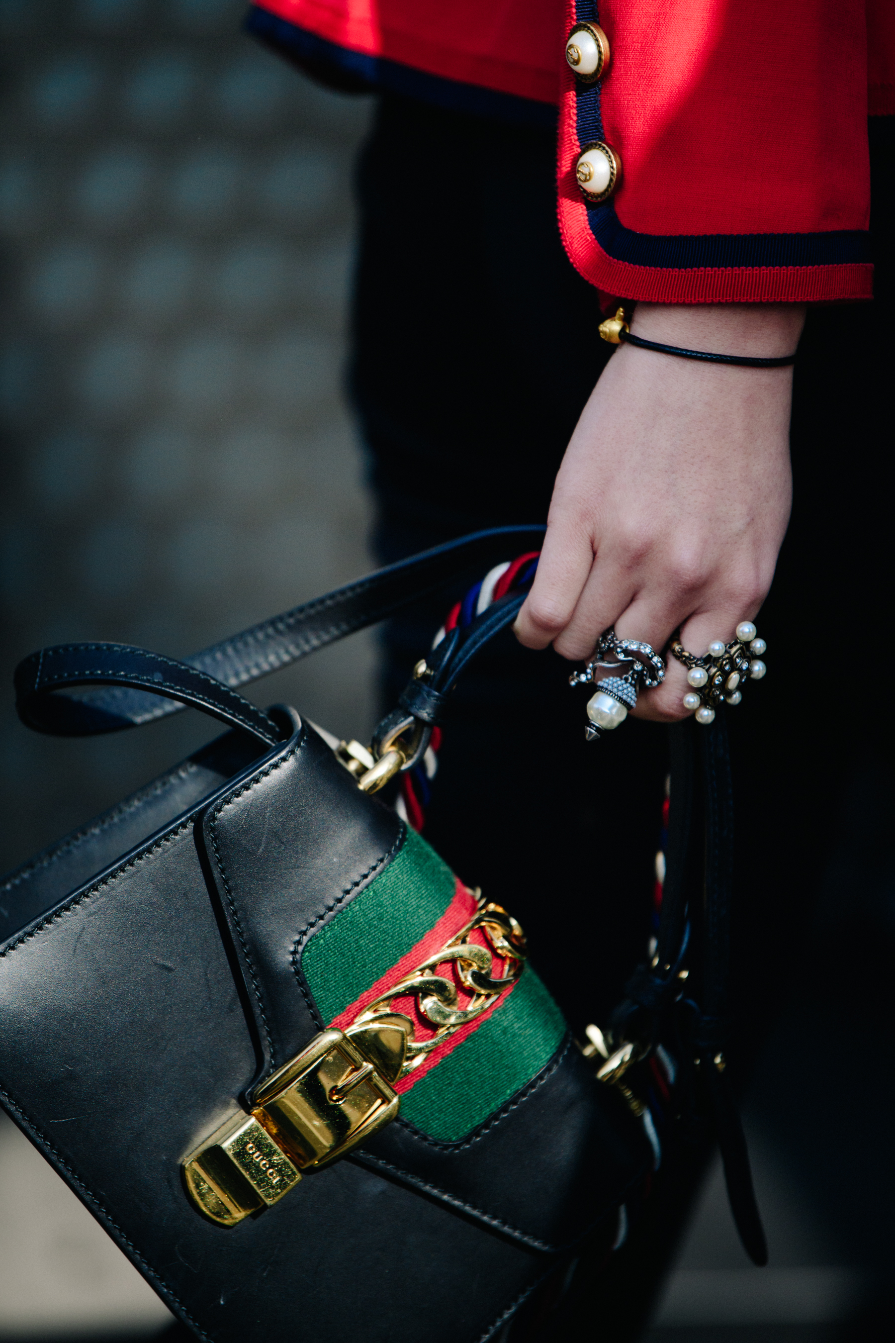 Woman carrying Gucci bag