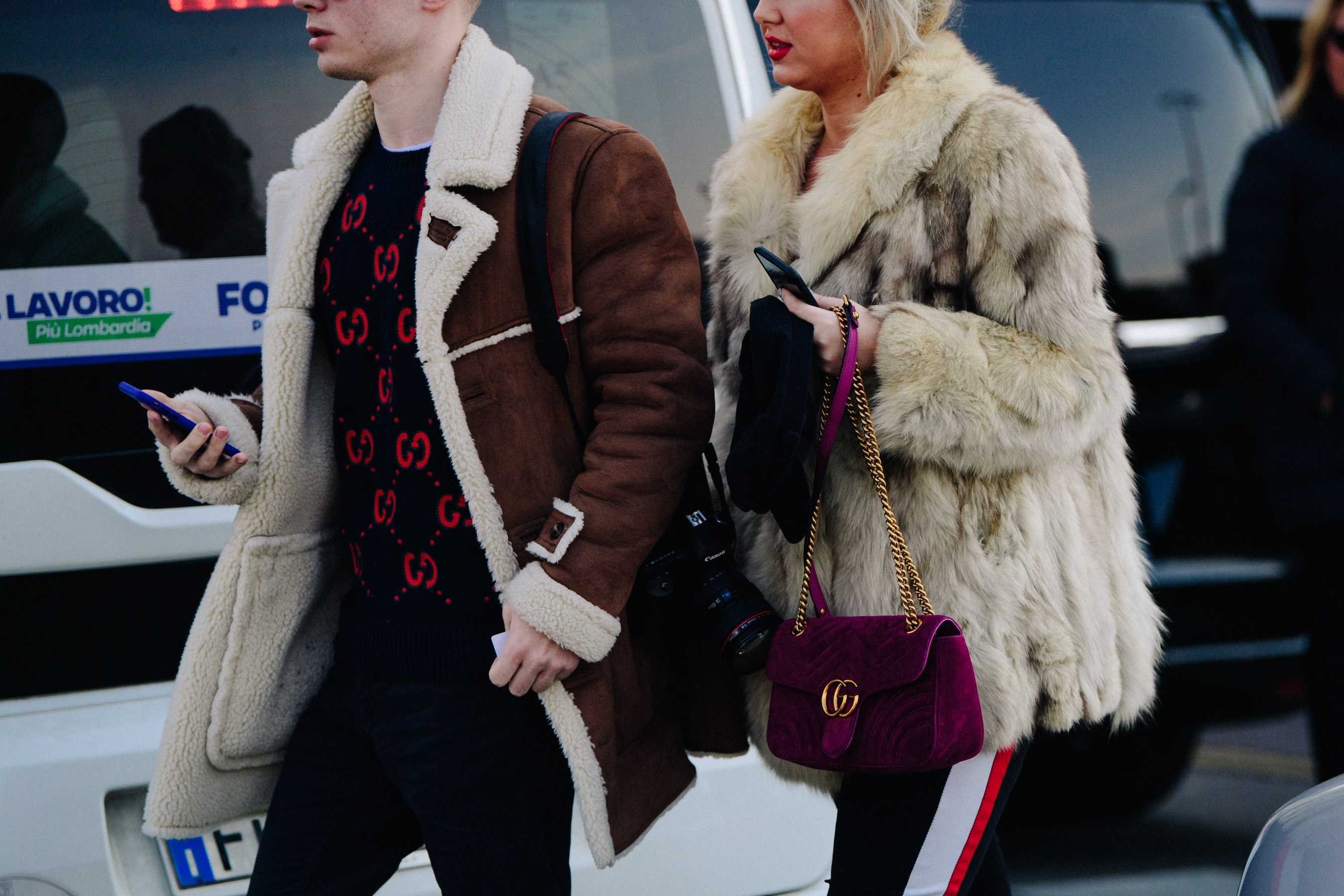 Couple wearing animal fur coats