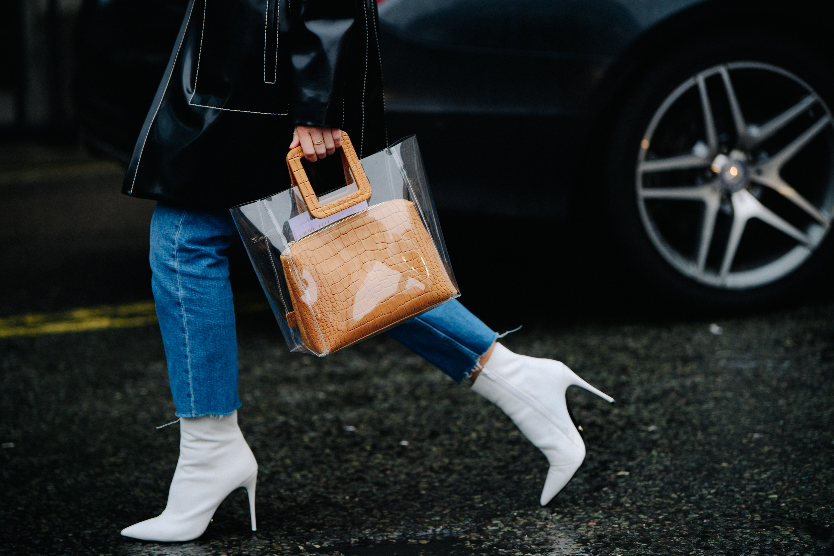 Woman wearing white heeled boots