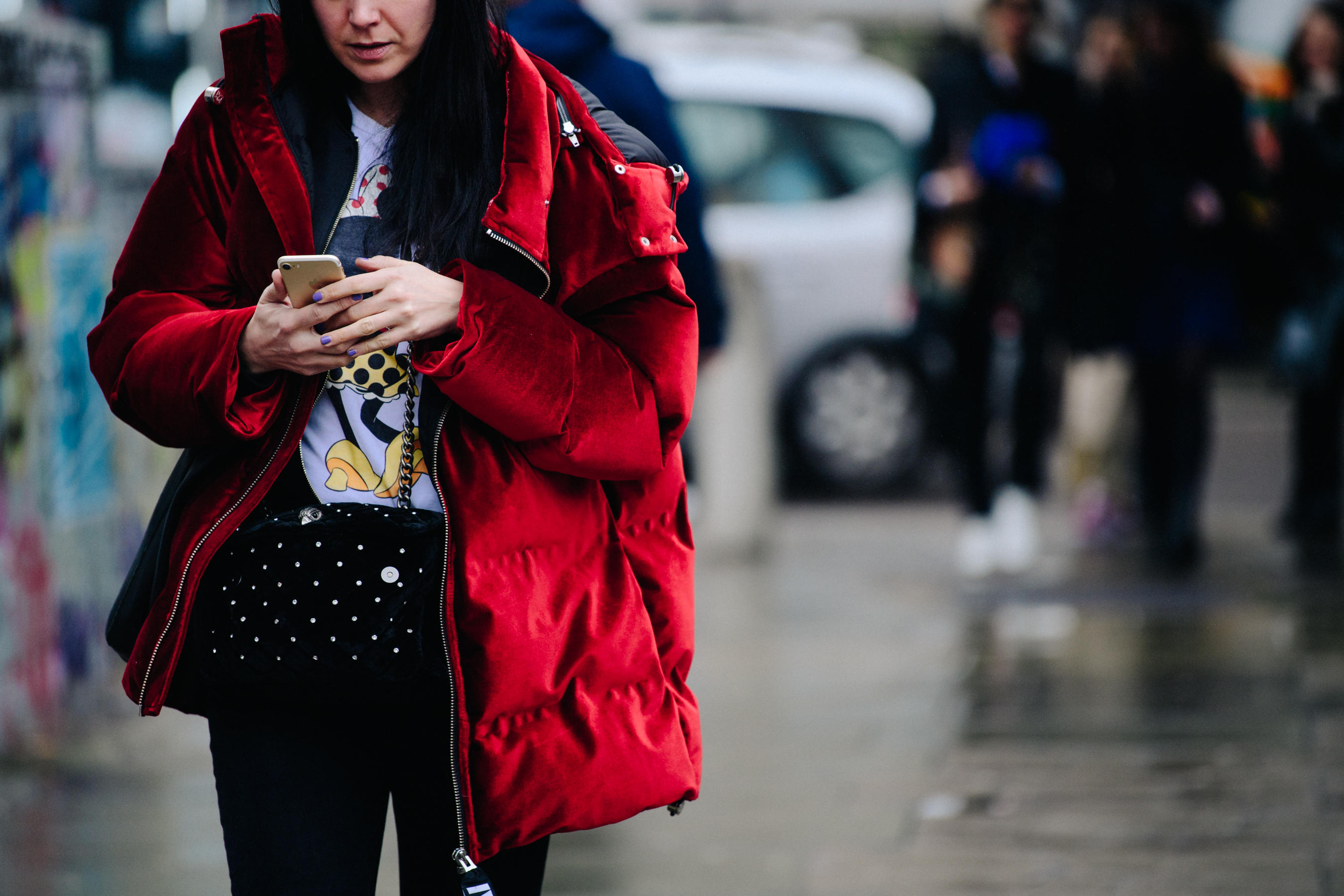 Woman wearing red puffer coat